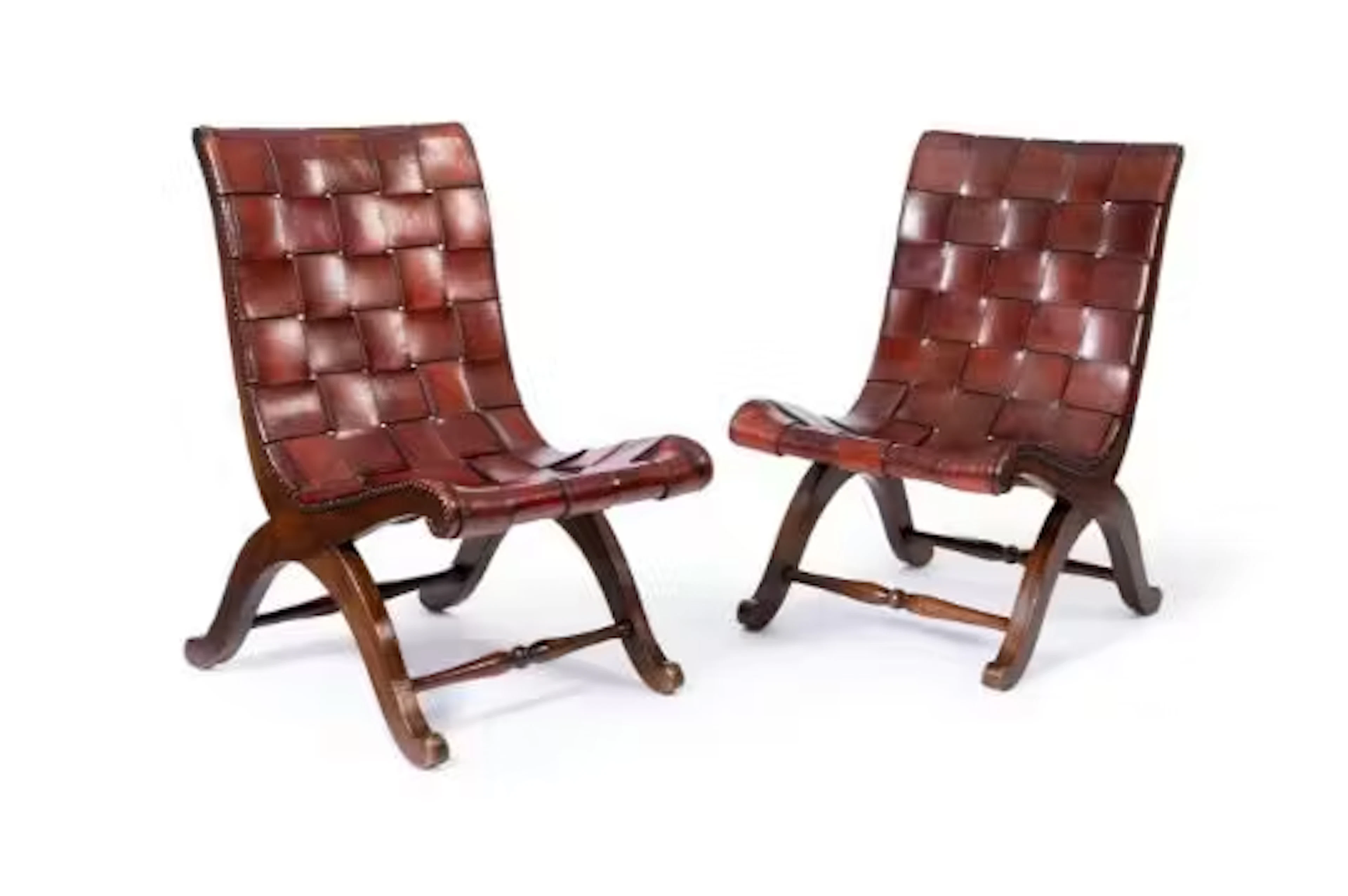 A PAIR OF LOW SLIPPER OR LOUNGE CHAIRS BY PIERRE LOTTIER, SECOND HALF