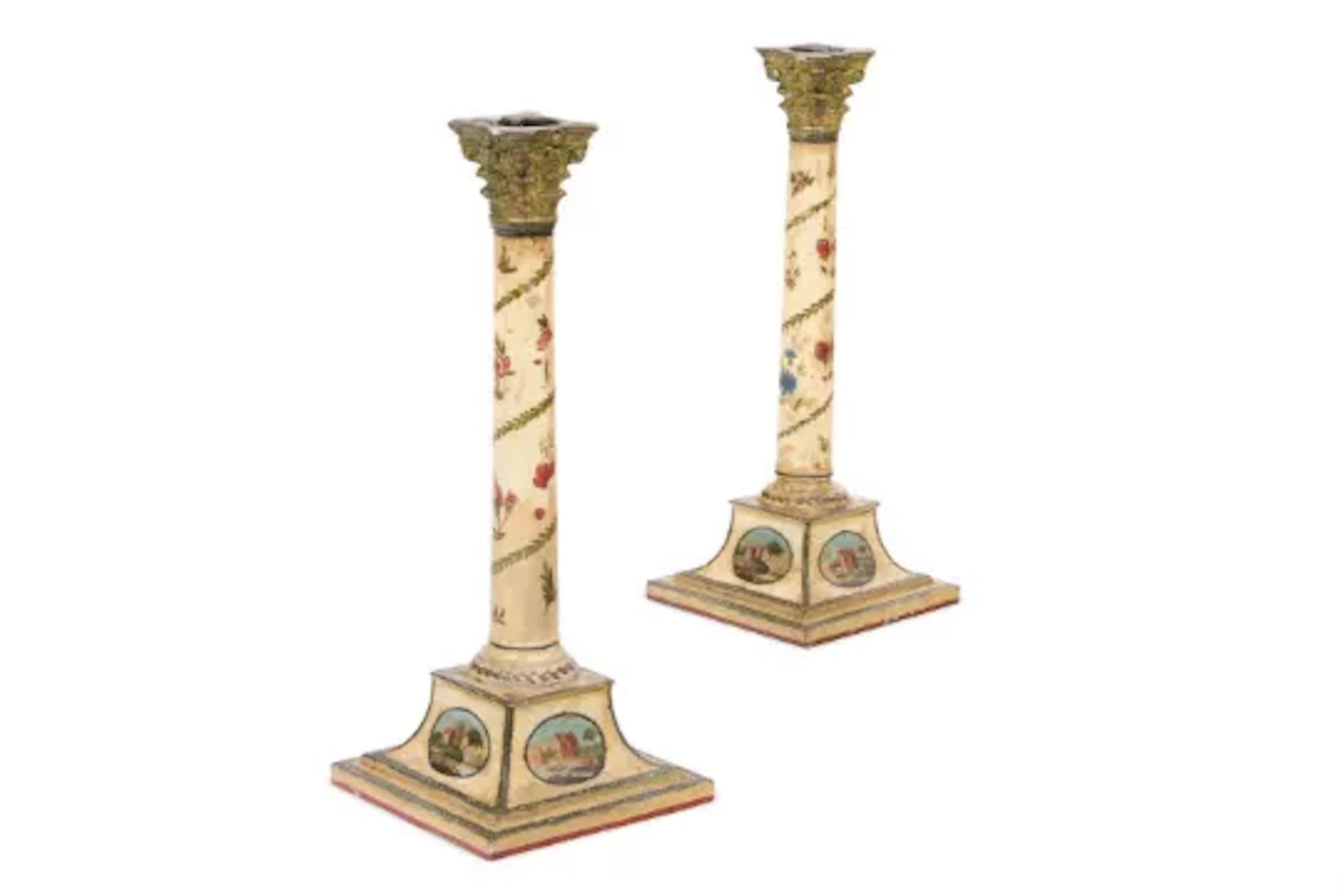 A PAIR OF LATE GEORGE III TOLE PEINTE CANDLESTICKS IN THE MANNER OF
