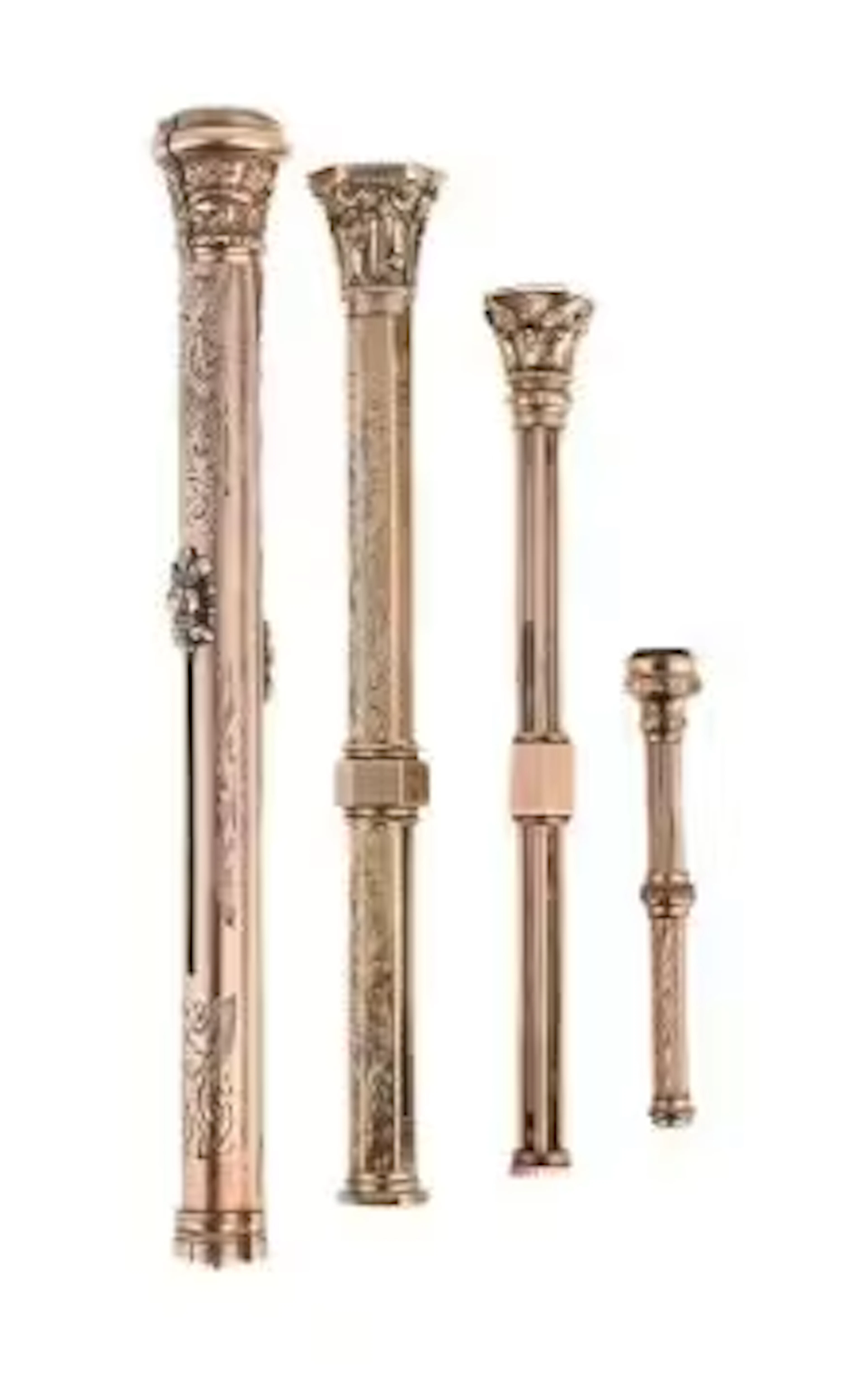 FOUR GOLD COLOURED PROPELLING PENCILS