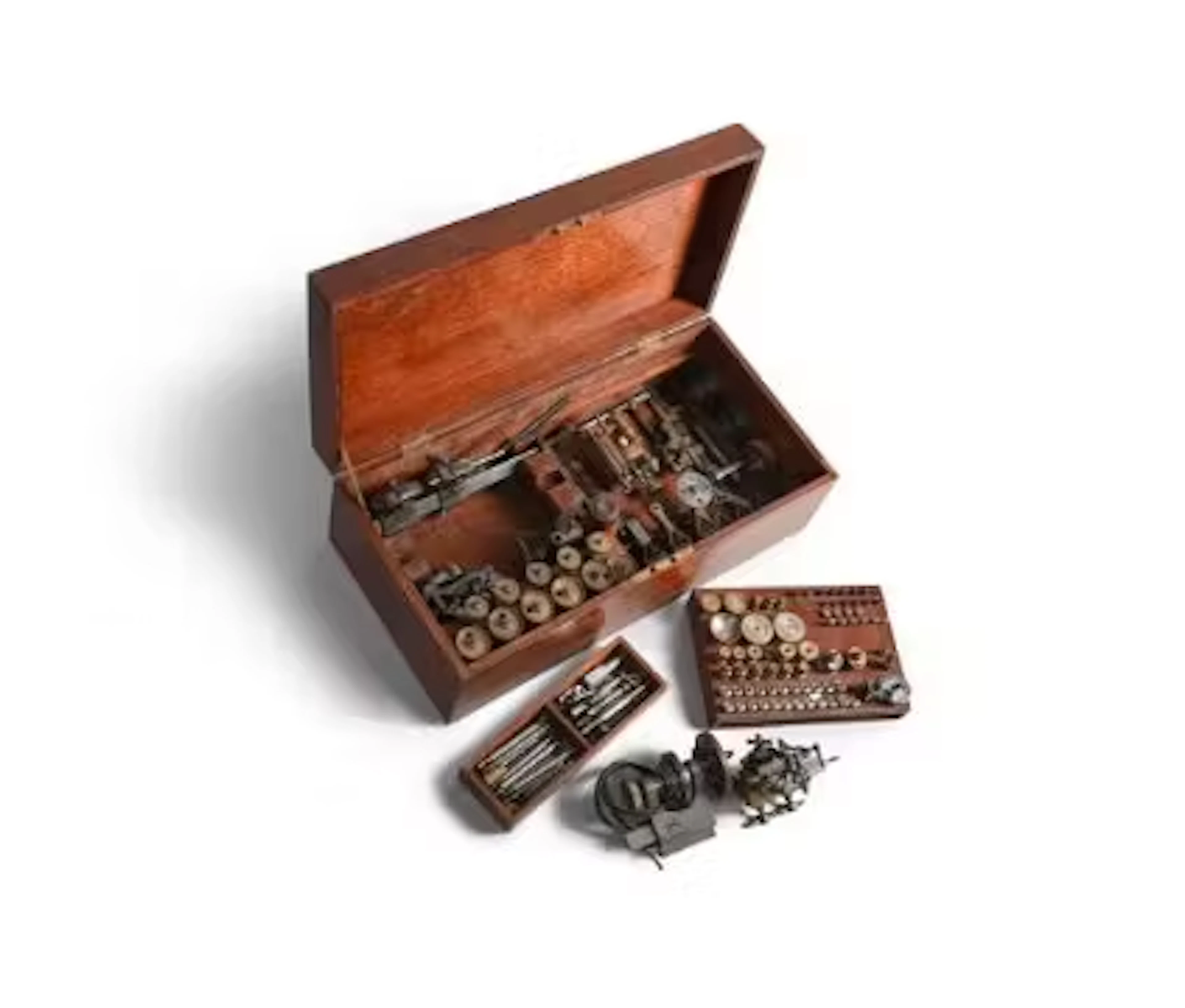 A FINE GERMAN STEEL AND BRASS WATCHMAKER’S 6MM LATHE OUTFIT WITH AN