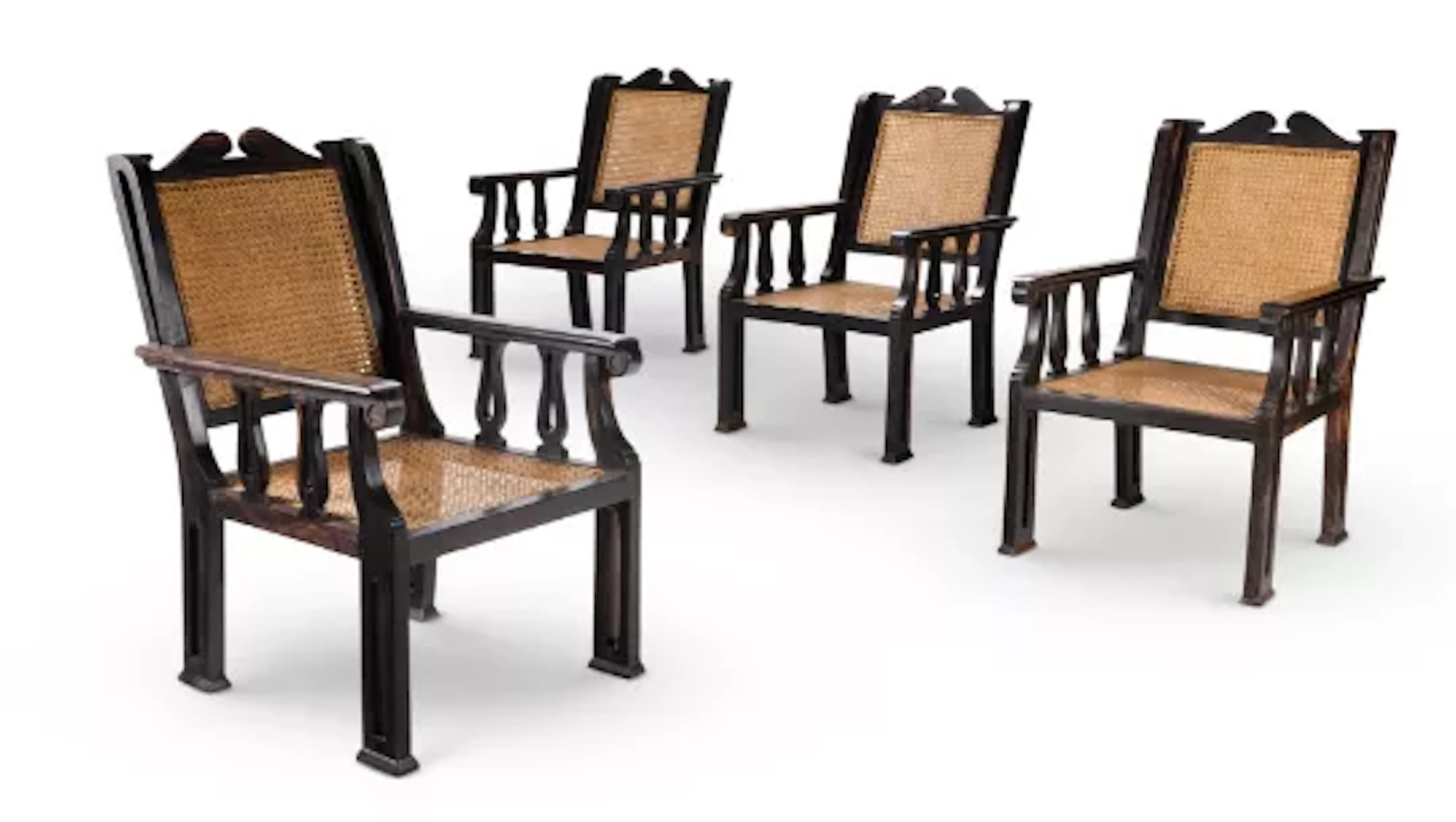 Y A SET OF FOUR EBONY ARMCHAIRS, INDIAN, MODERN