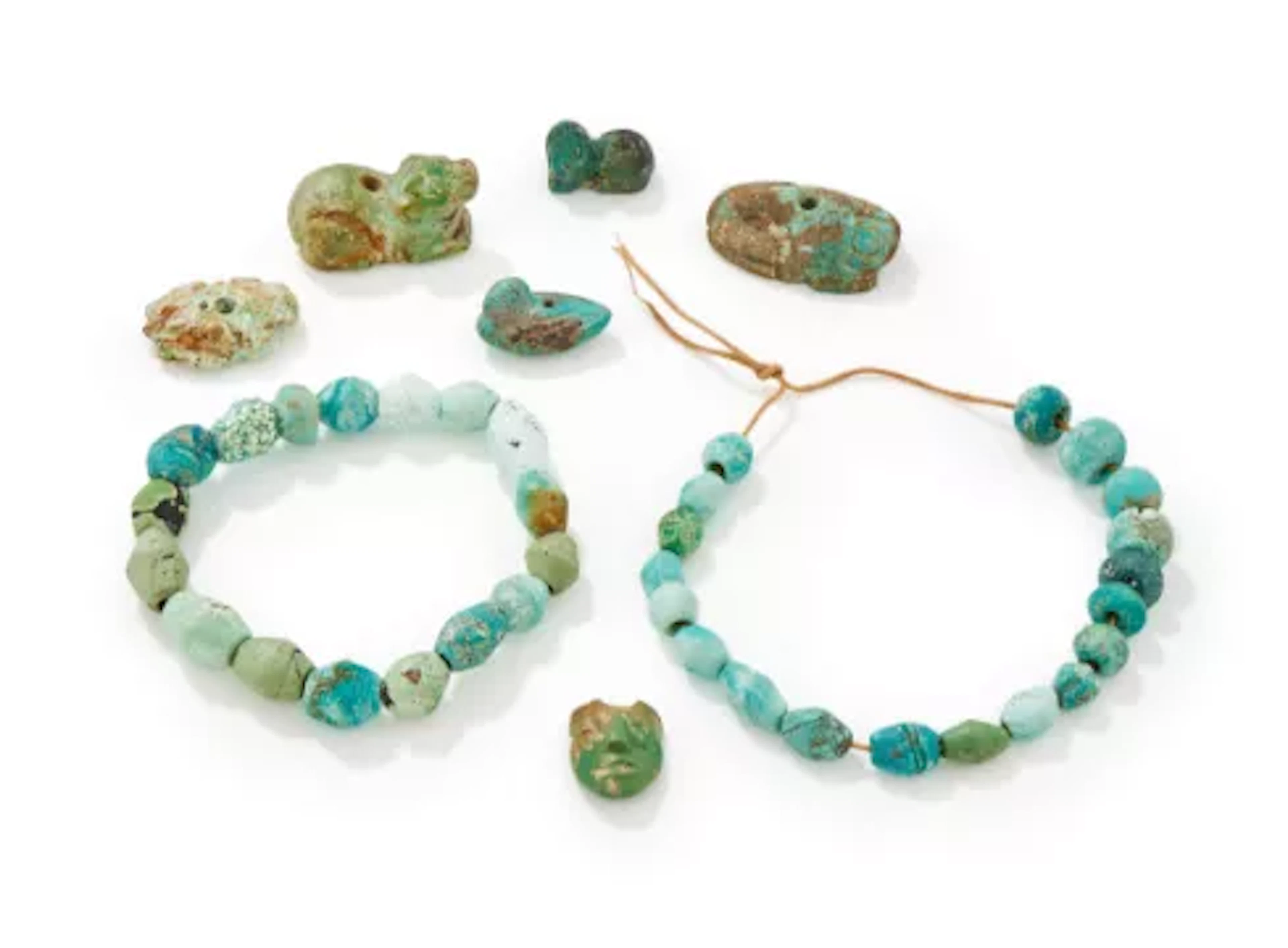 A group of turquoise beads, 2nd century and later