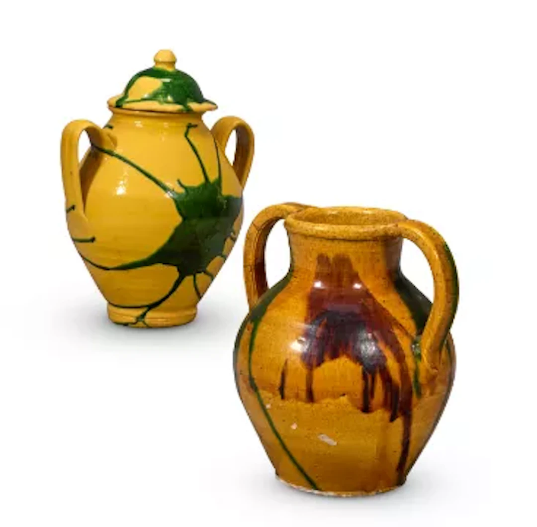 A FRENCH PROVINCIAL OCHRE, GREEN AND BROWN GLAZED ORJOL, LATE 19TH