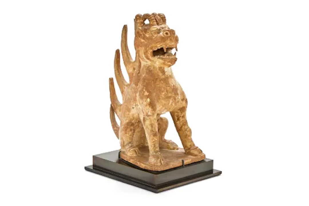 A Chinese painted pottery figure of an Earth spirit, Northern Wei