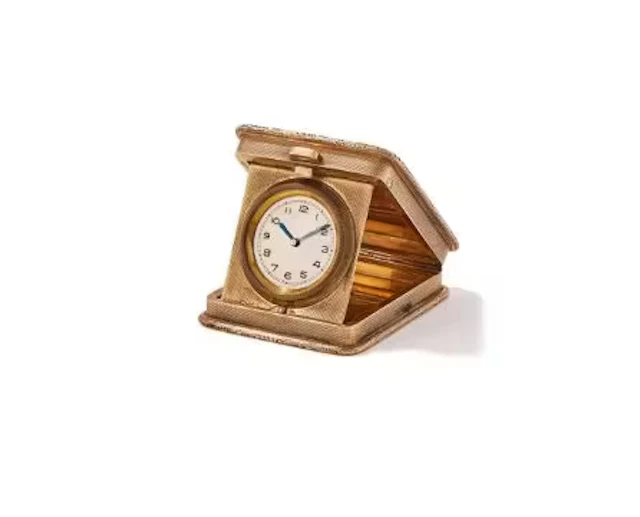 A 9 CARAT GOLD SQUARE TRAVEL CLOCK