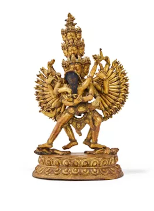 A large Sino-Tibetan gilt-bronze figure of Chakrasamvara and Vajravarahi