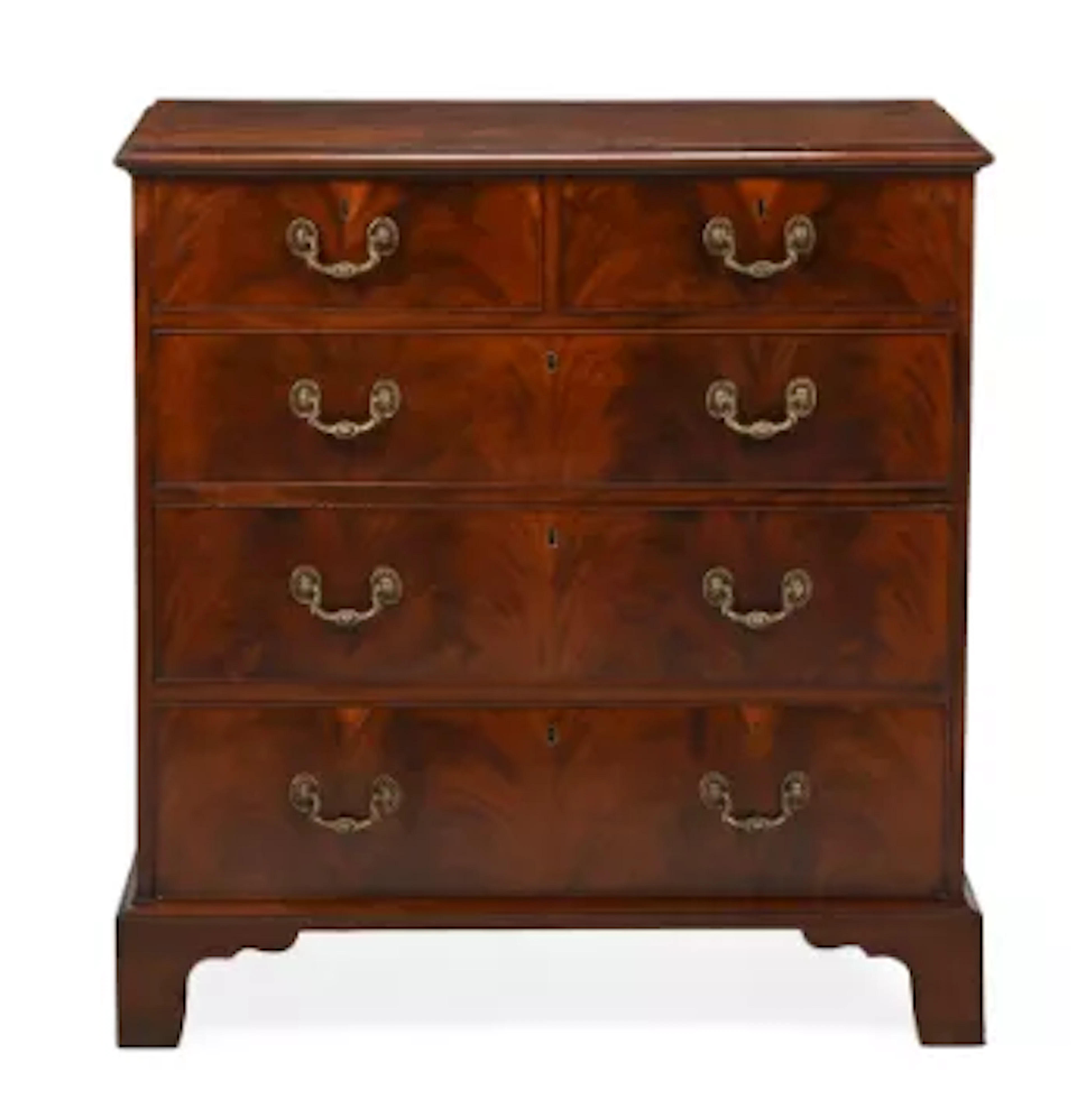 A GEORGE III MAHOGANY AND CROSSBANDED CHEST OF DRAWERS, CIRCA 1790