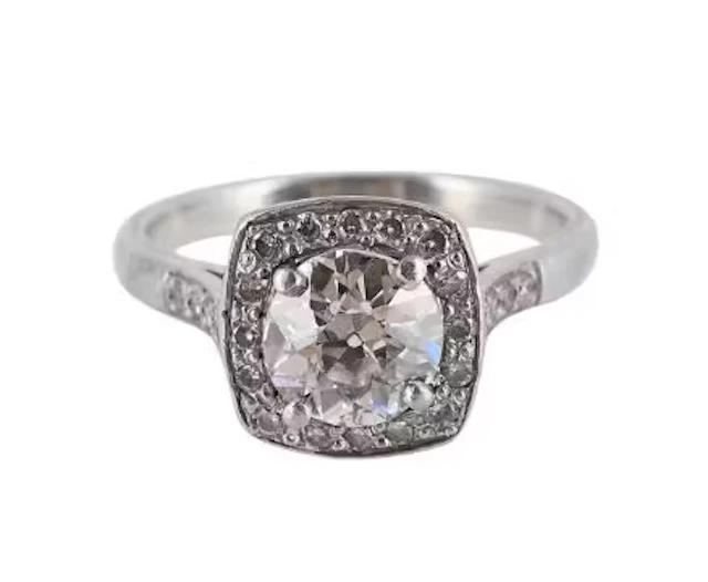 A DIAMOND SINGLE STONE RING