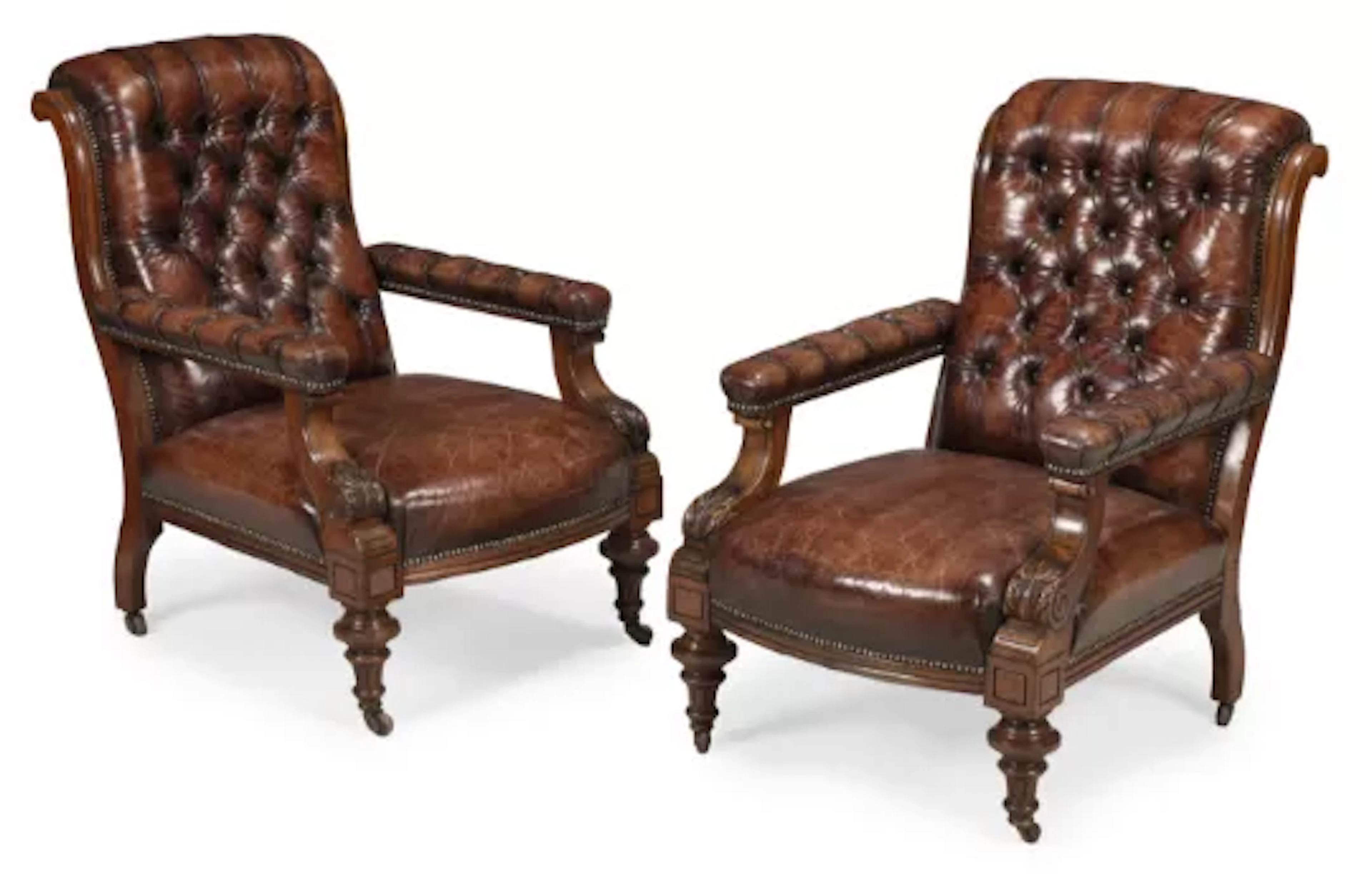 A PAIR OF VICTORIAN WALNUT, BRASS STUDDED AND BUTTONED RED LEATHER