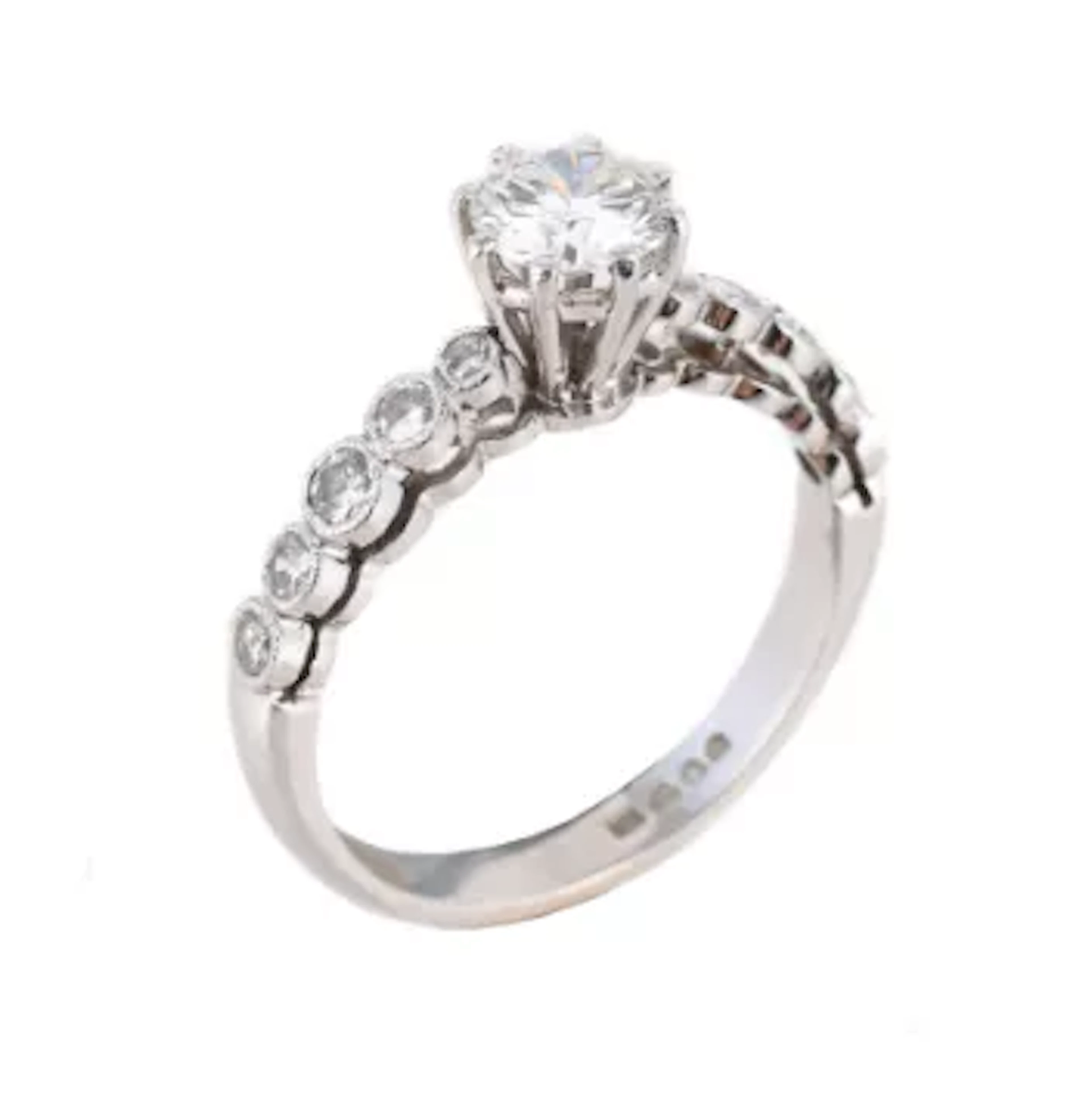 A DIAMOND SINGLE STONE RING