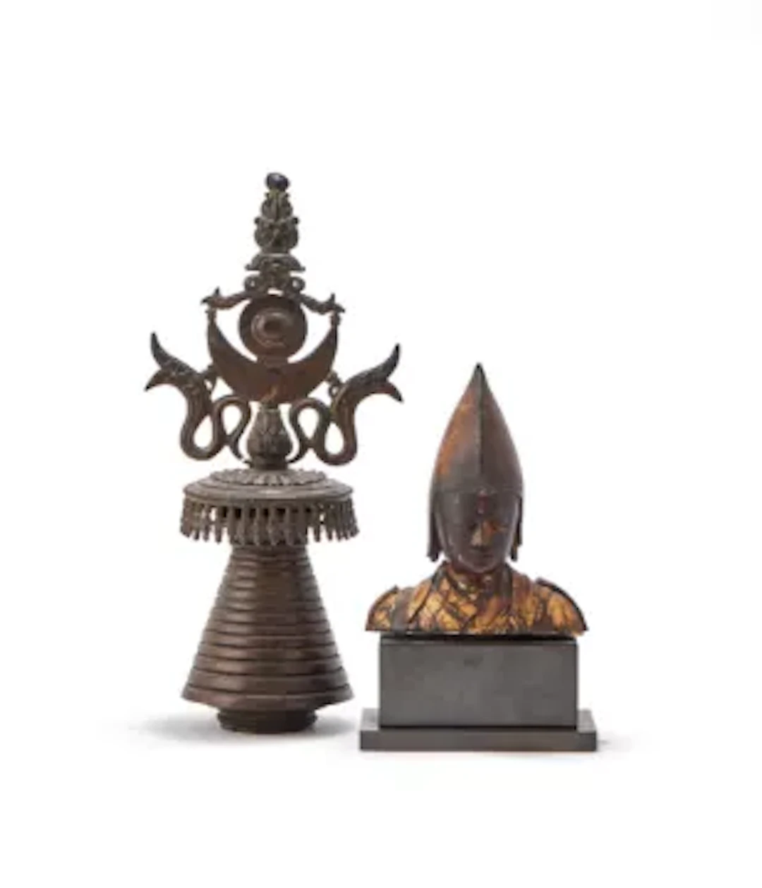 A gilt and lacquered wooden bust of a Tibetan Lhama, 18th Century