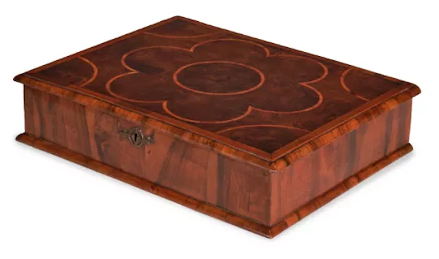 A WILLIAM & MARY OLIVEWOOD OYSTER, WALNUT AND HOLLY INLAID LACE BOX, CIRCA 1690