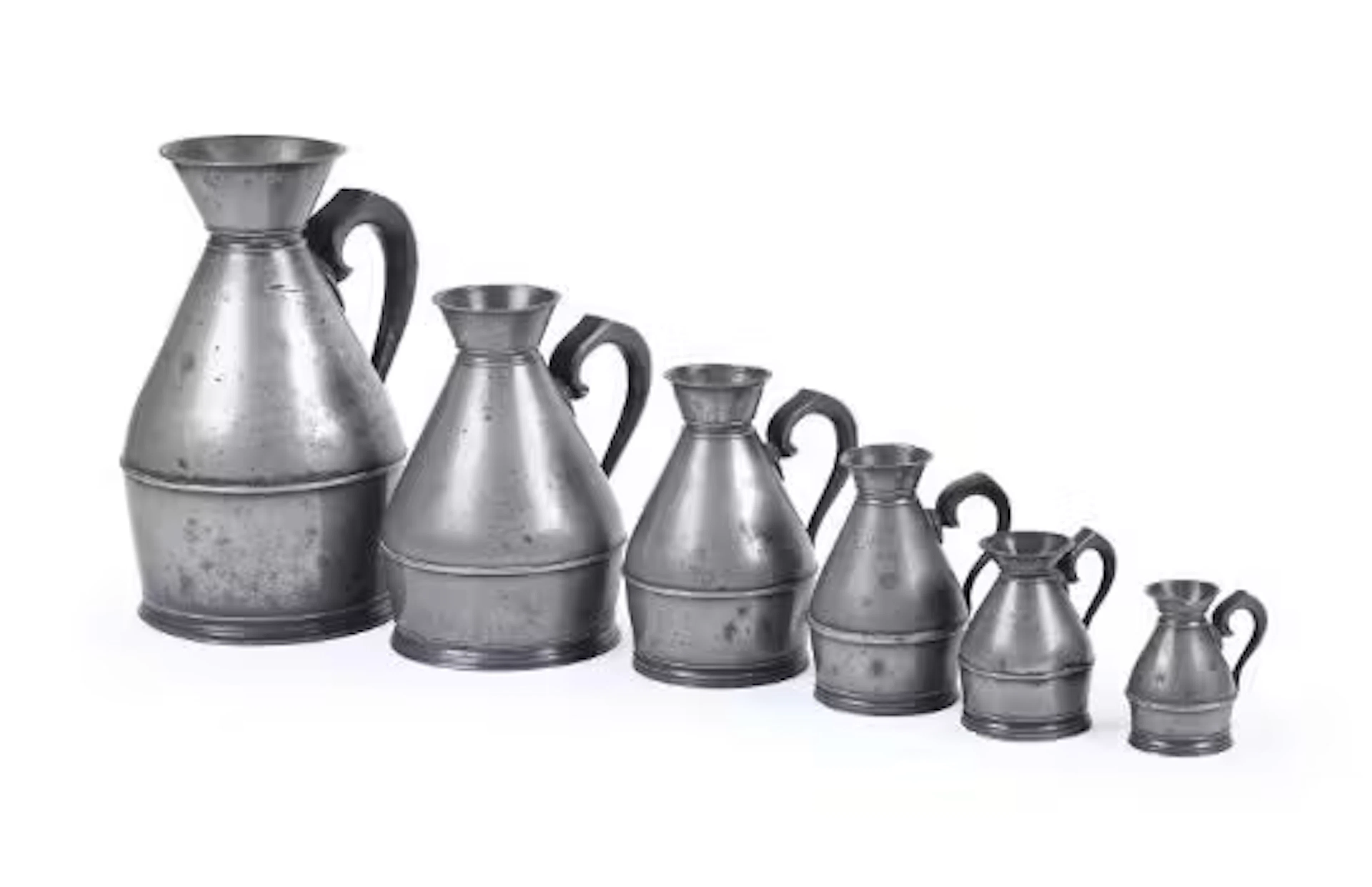 A SET OF SIX IRISH GRADUATED PEWTER 'HAYSTACK' MEASURES, FIRST HALF