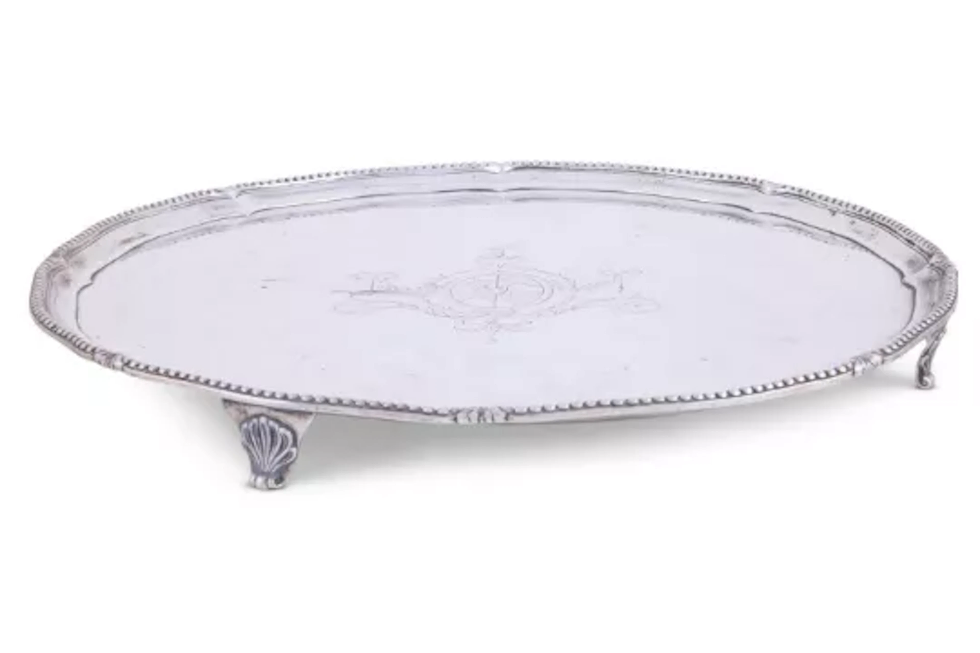A GEORGE III SILVER SHAPED CIRCULAR SALVER