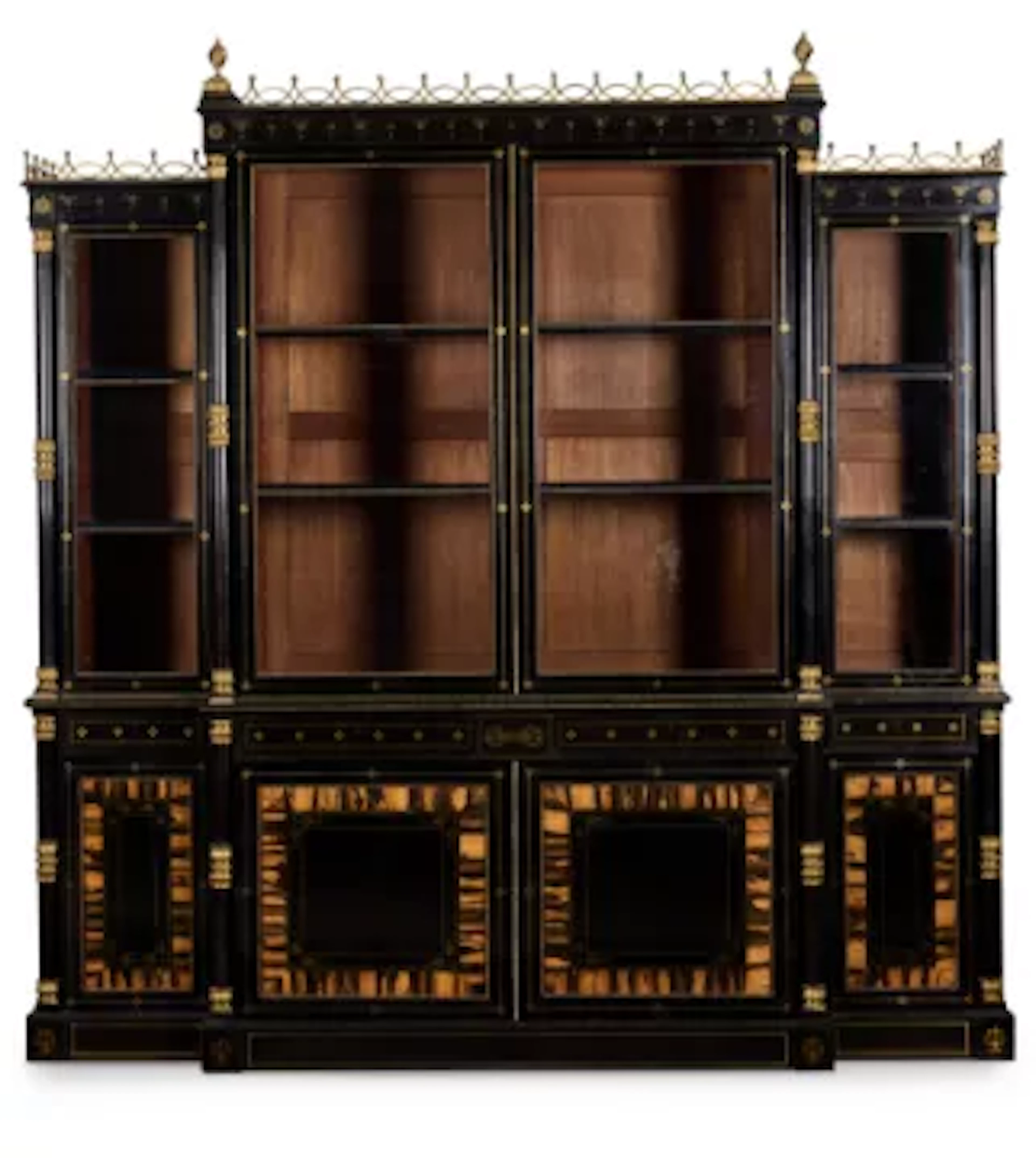 Y A REGENCY GILT-BRASS MOUNTED AND INLAID EBONY AND CALAMANDER BREAKFRONT