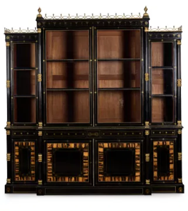 Y A REGENCY GILT-BRASS MOUNTED AND INLAID EBONY AND CALAMANDER BREAKFRONT