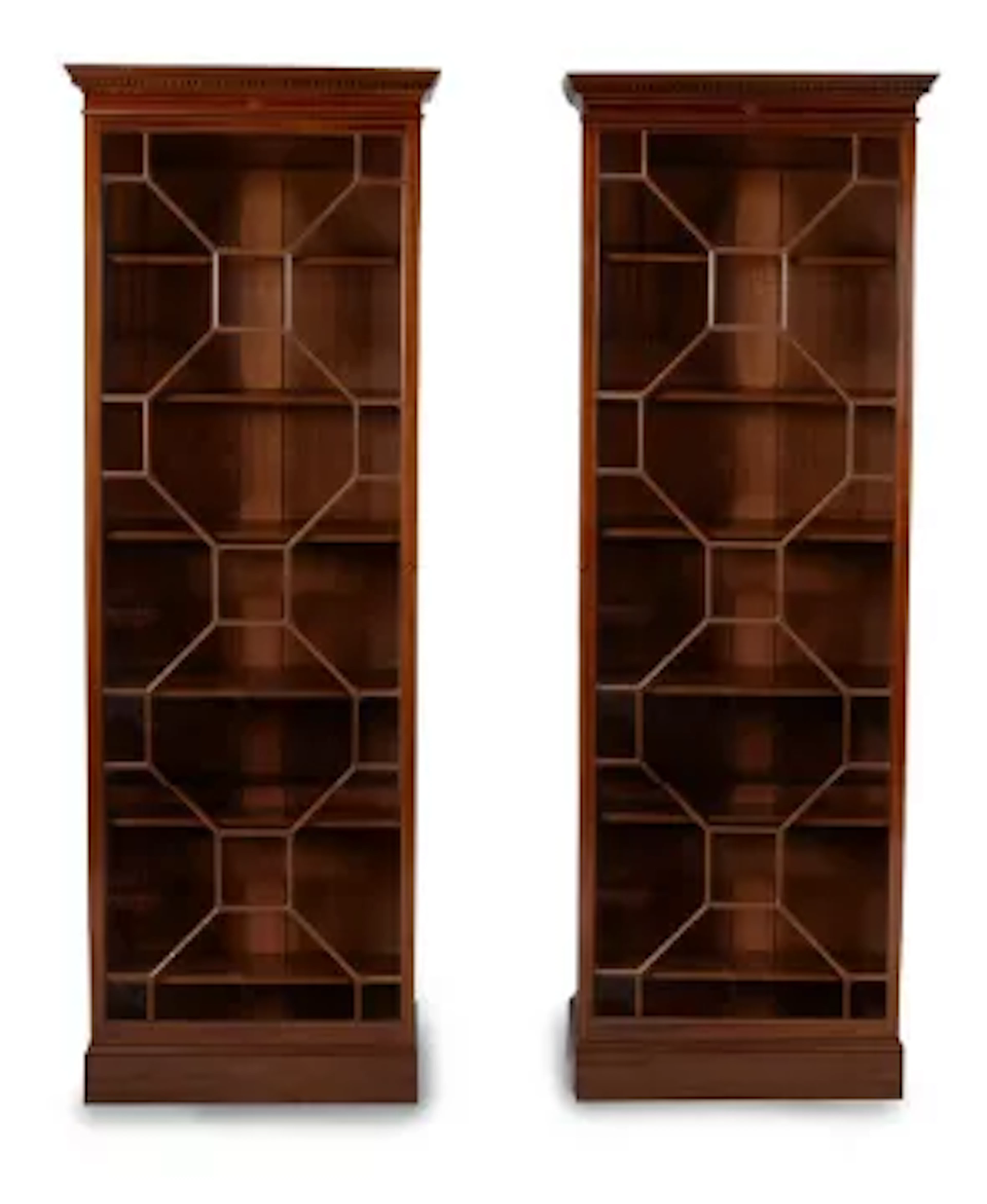 A PAIR OF MAHOGANY BOOKCASES, BY HOWARD & SONS, IN GEORGE III STYLE, CIRCA 1890