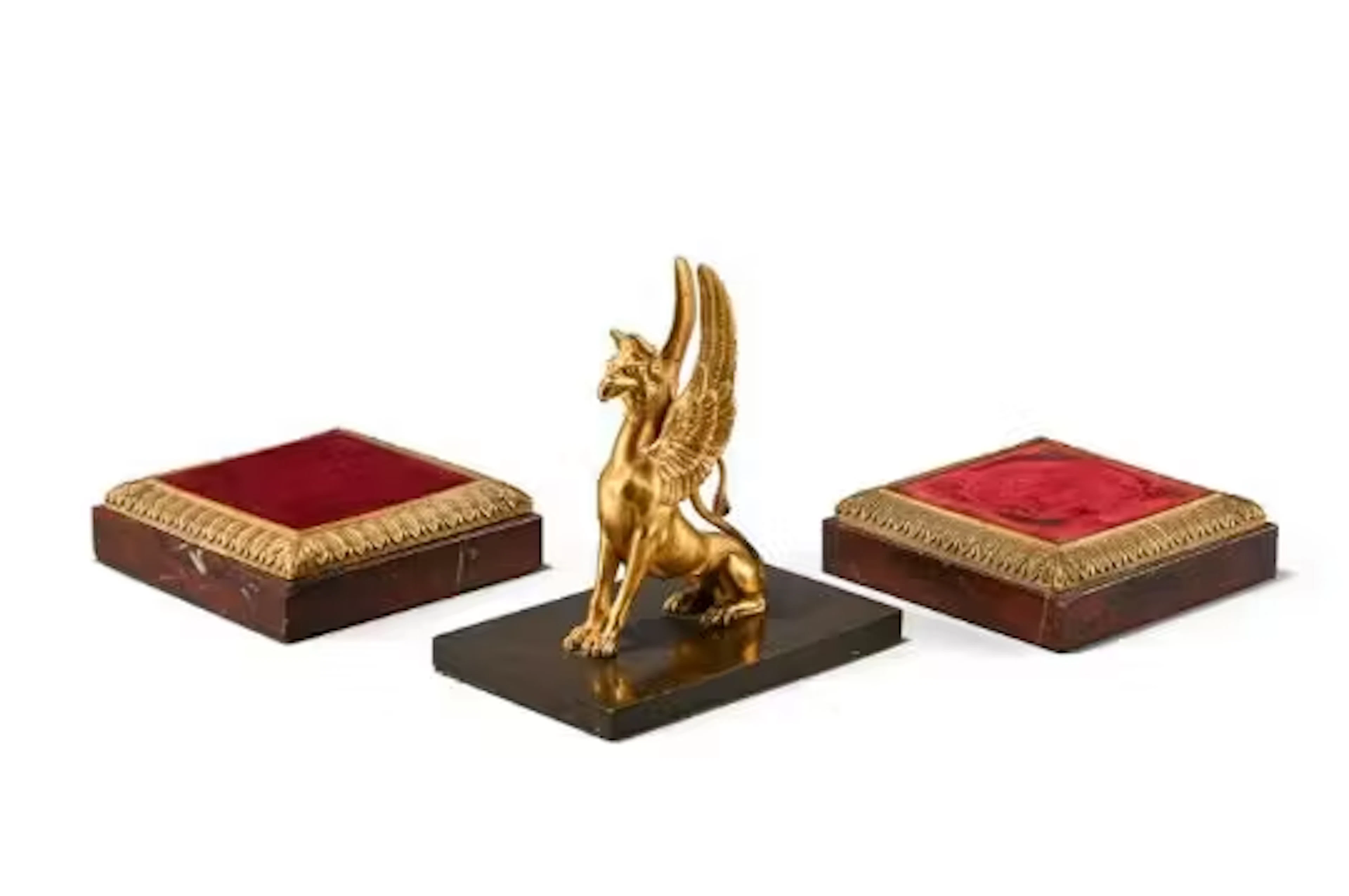 A GILT BRONZE AND MARBLE GRIFFIN PAPERWEIGHT, EARLY 19TH CENTURY