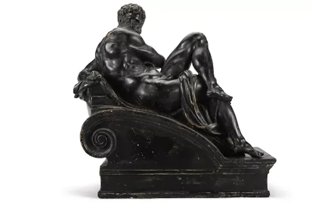AFTER MICHELANGELO (1475-1564), A PLASTER FIGURE 'ALLEGORY OF DAY'
