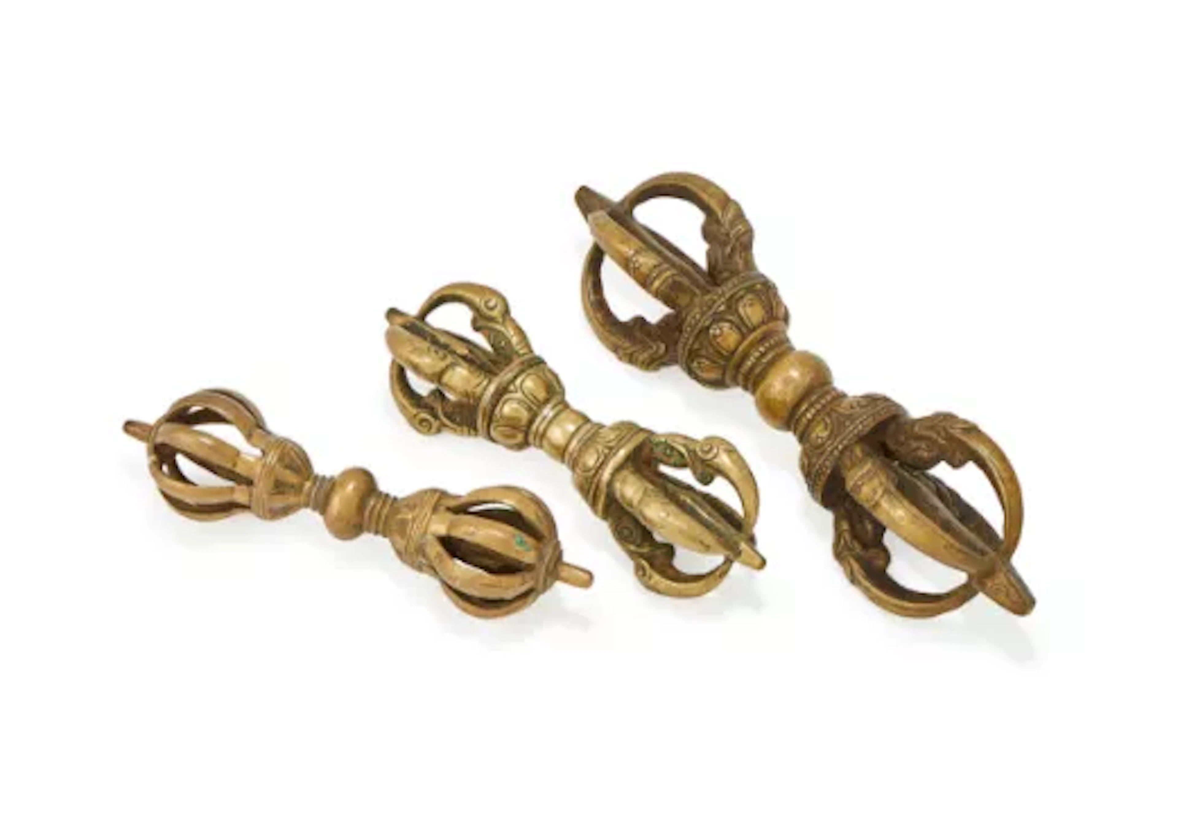 Three various Tibetan gilt-copper vajra, 17th to 19th century