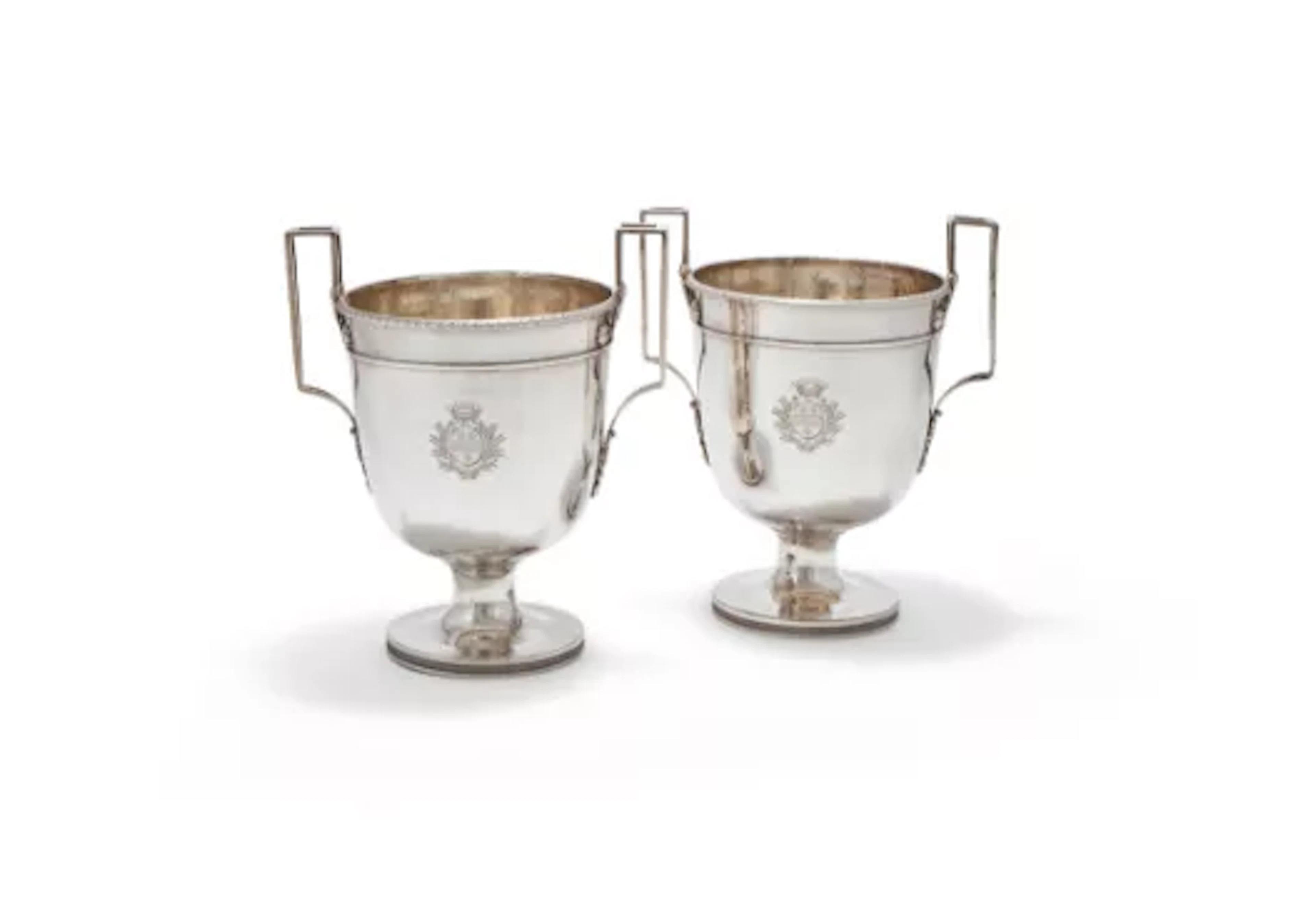 A PAIR OF FRENCH SILVER TWIN HANDLED PEDESTAL WINE COOLERS, MAKER'S