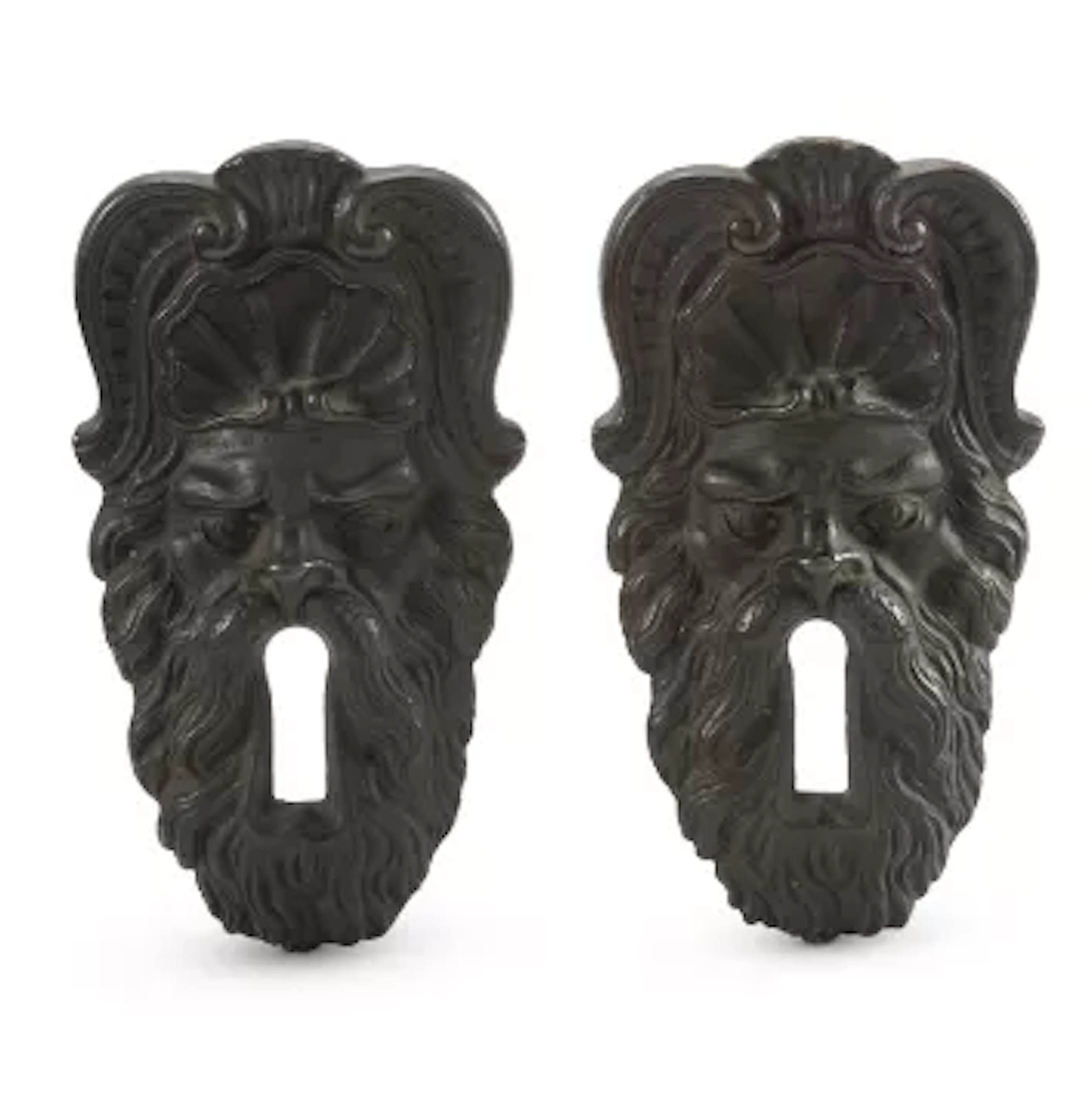 A PAIR OF BRONZE MASK ESCUTCHEONS, ITALIAN, PROBABLY FLORENCE, 18TH CENTURY