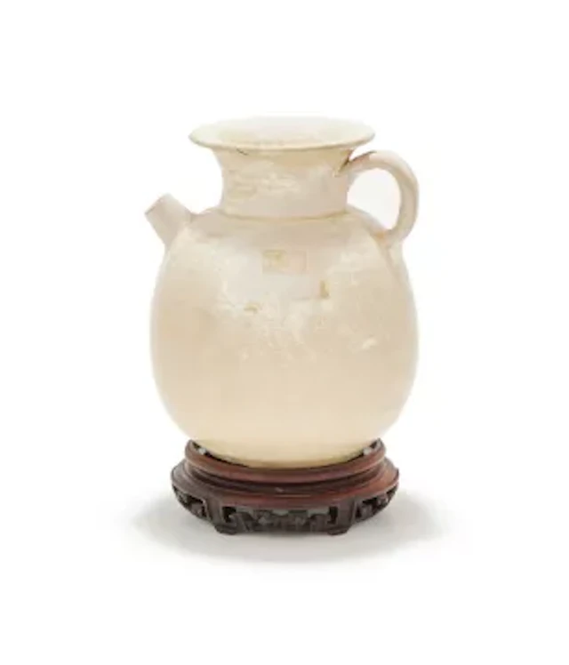 A Chinese white glazed ewer, Sui or Tang Dynasty