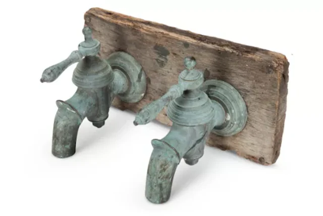 A PAIR OF BRONZE TAPS, 19TH CENTURY