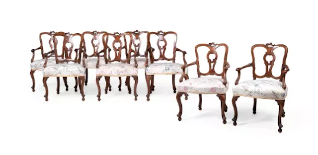 A SET OF EIGHT WALNUT AND UPHOLSTERED ARMCHAIRS, ITALIAN, SECOND HALF