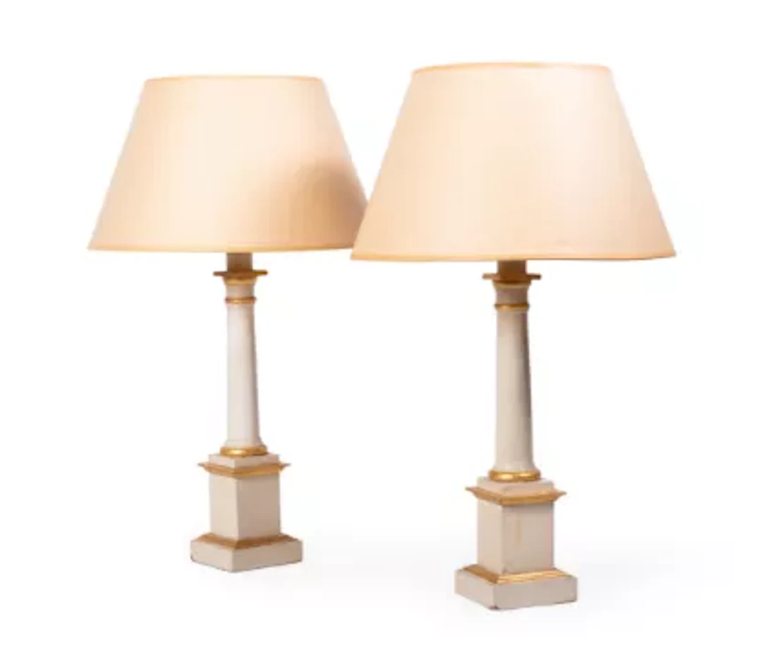 A PAIR OF CREAM AND GILT DECORATED TABLE LAMPS BY SIBYL COLEFAX &