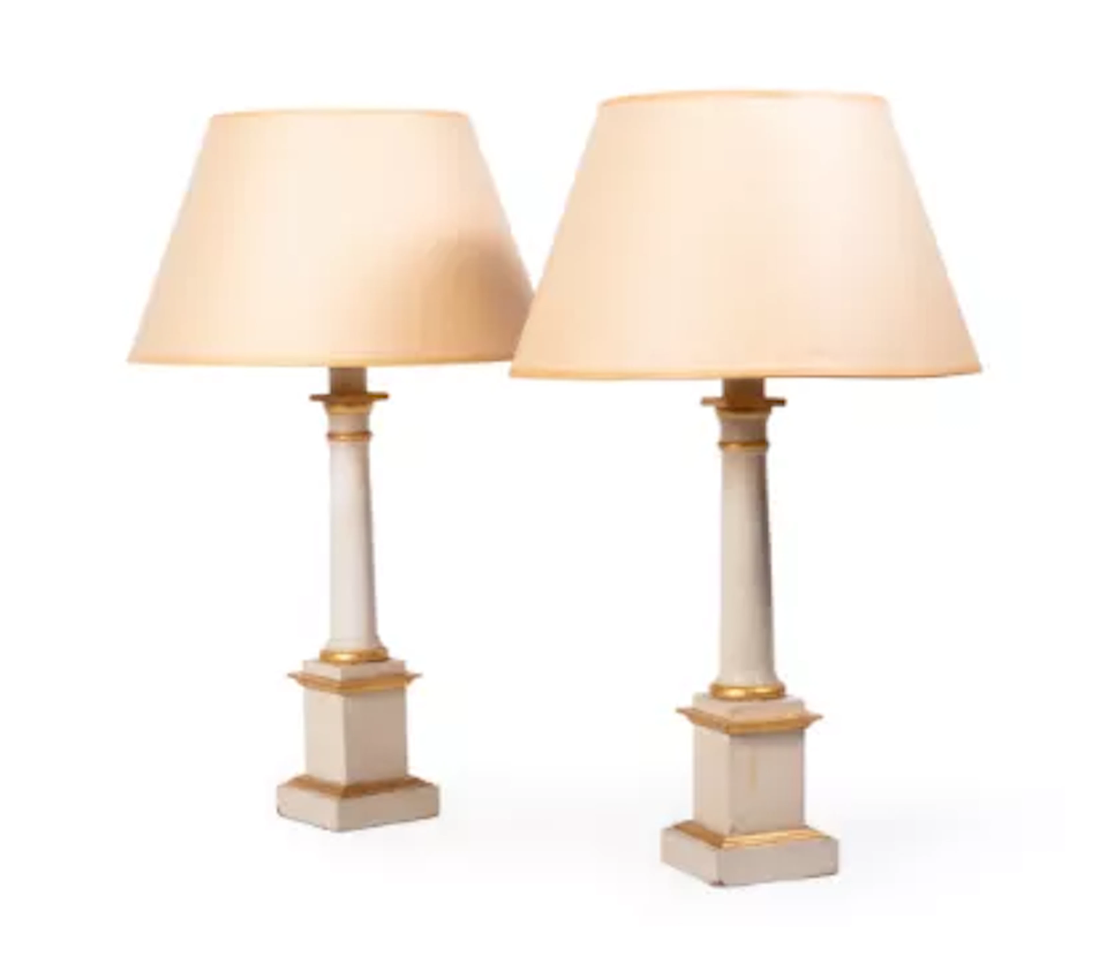 A PAIR OF CREAM AND GILT DECORATED TABLE LAMPS BY SIBYL COLEFAX &