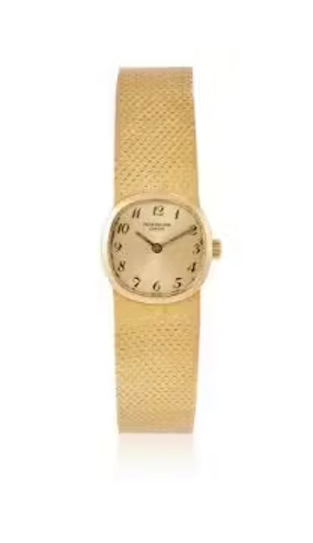 PATEK PHILIPPE, ELLIPSE, REF. 3370/1, A LADY'S 18 CARAT GOLD BRACELET WATCH