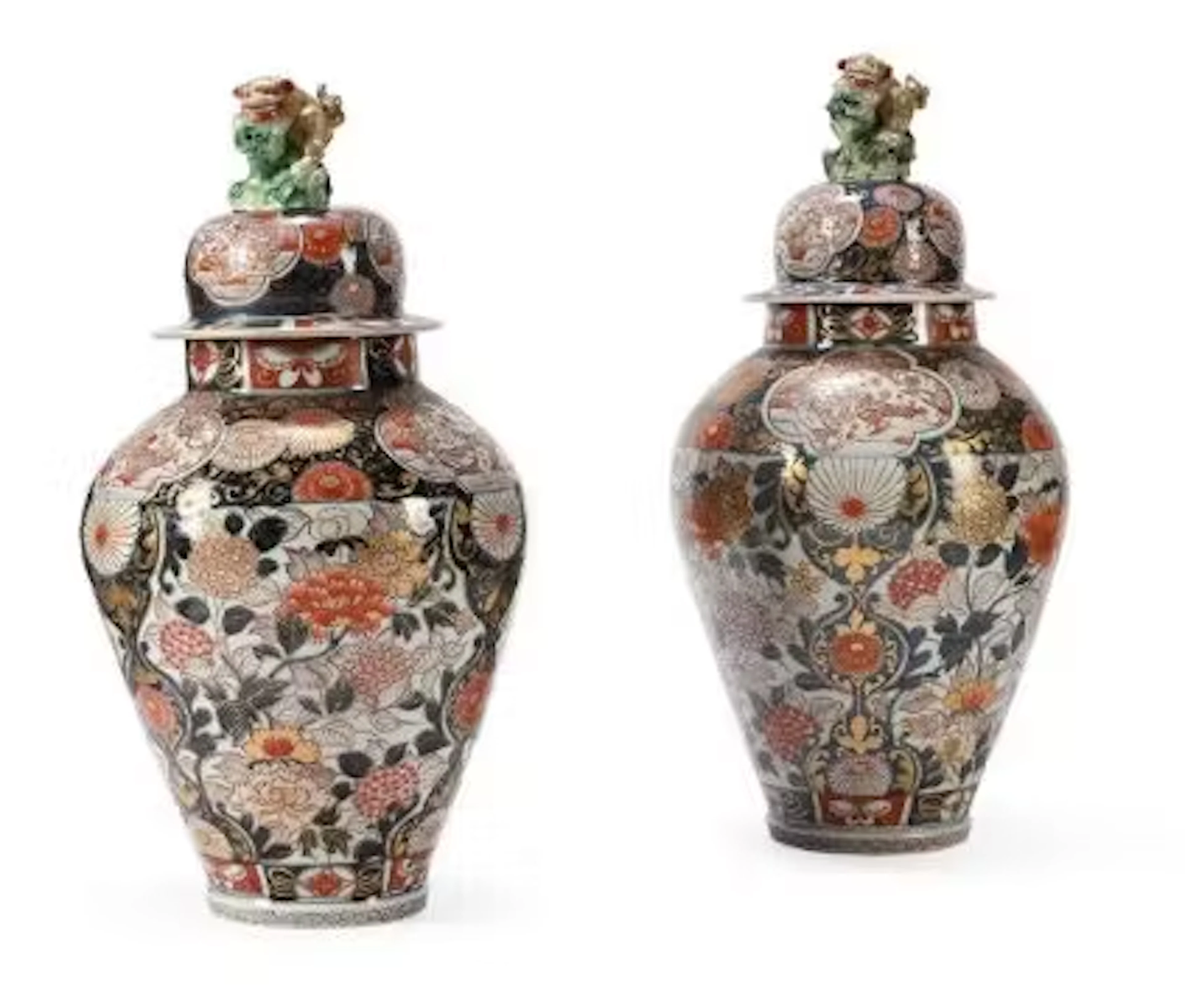A large pair of Japanese Arita vases and covers