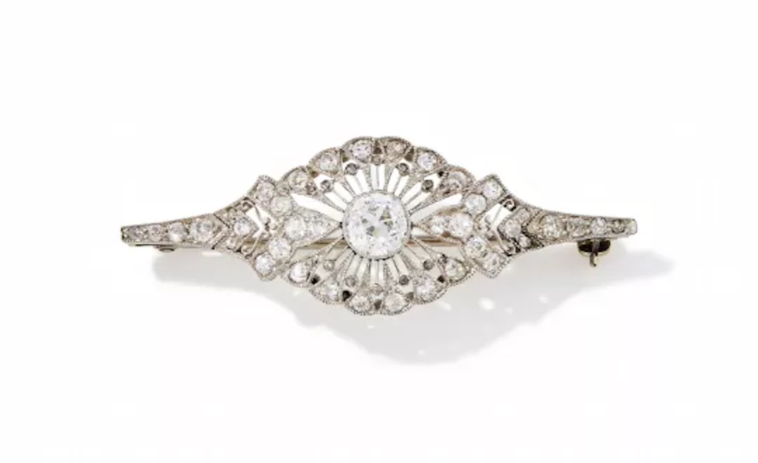 A 1920S AND LATER DIAMOND BROOCH