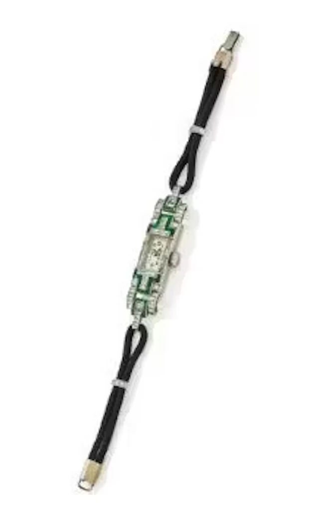 AN ART DECO EMERALD AND DIAMOND COCKTAIL WATCH