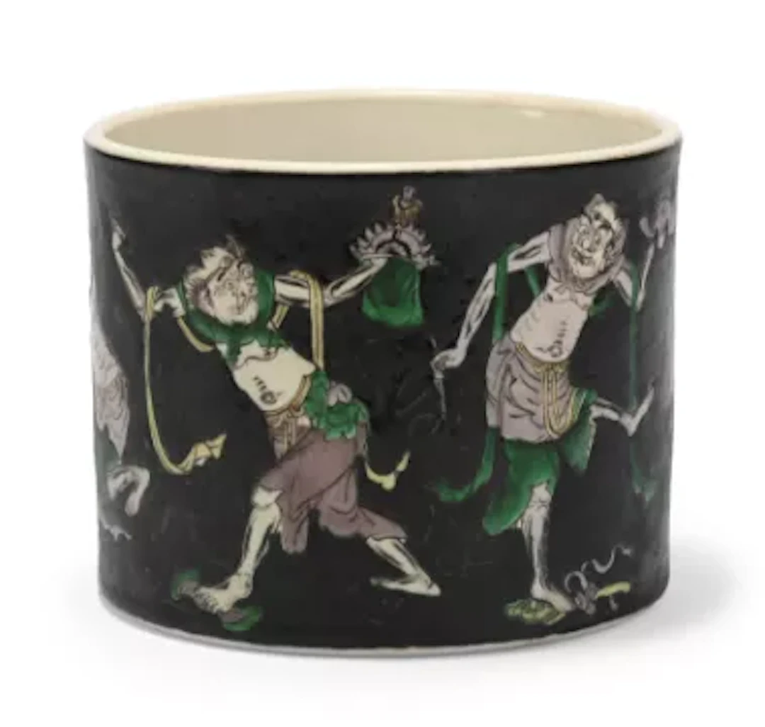 A Chinese famille noire brush pot, Qing dynasty