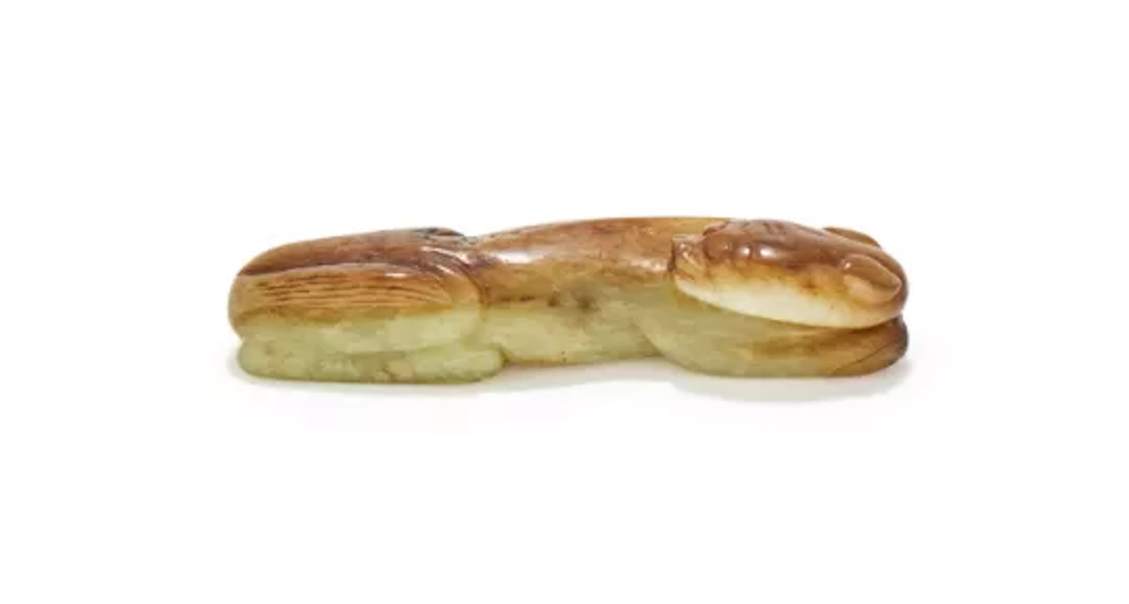 A Chinese yellow jade model of a tiger, Song or Ming Dynasty