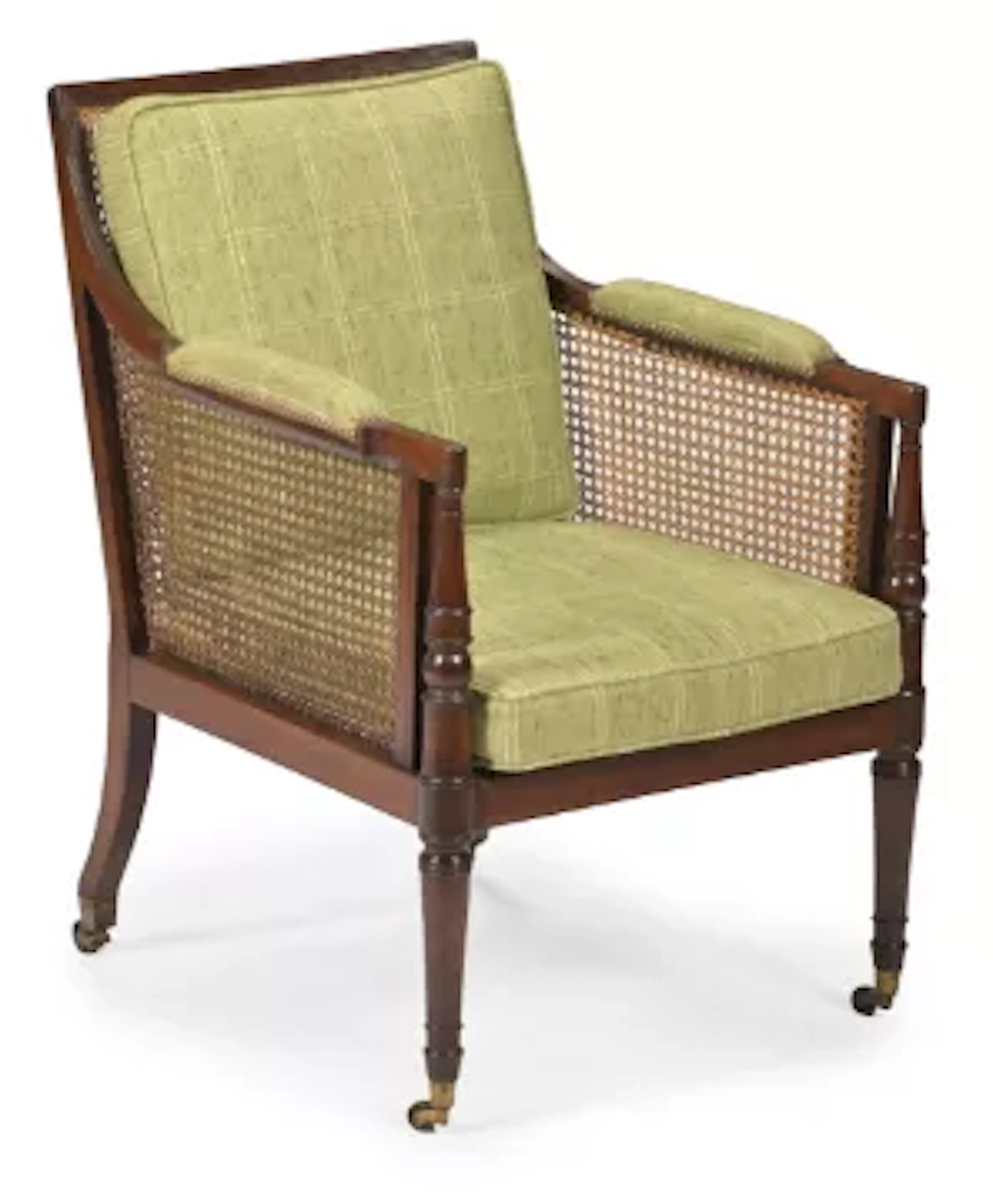 A REGENCY MAHOGANY BERGERE LIBRARY ARMCHAIR, ATTRIBUTED TO GILLOWS, CIRCA 1815