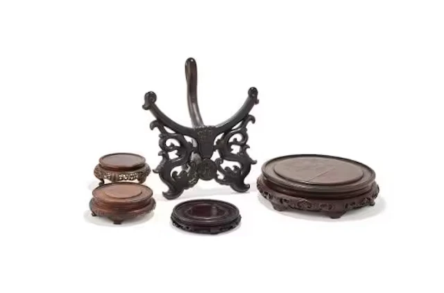 Four Chinese carved circular wood stands