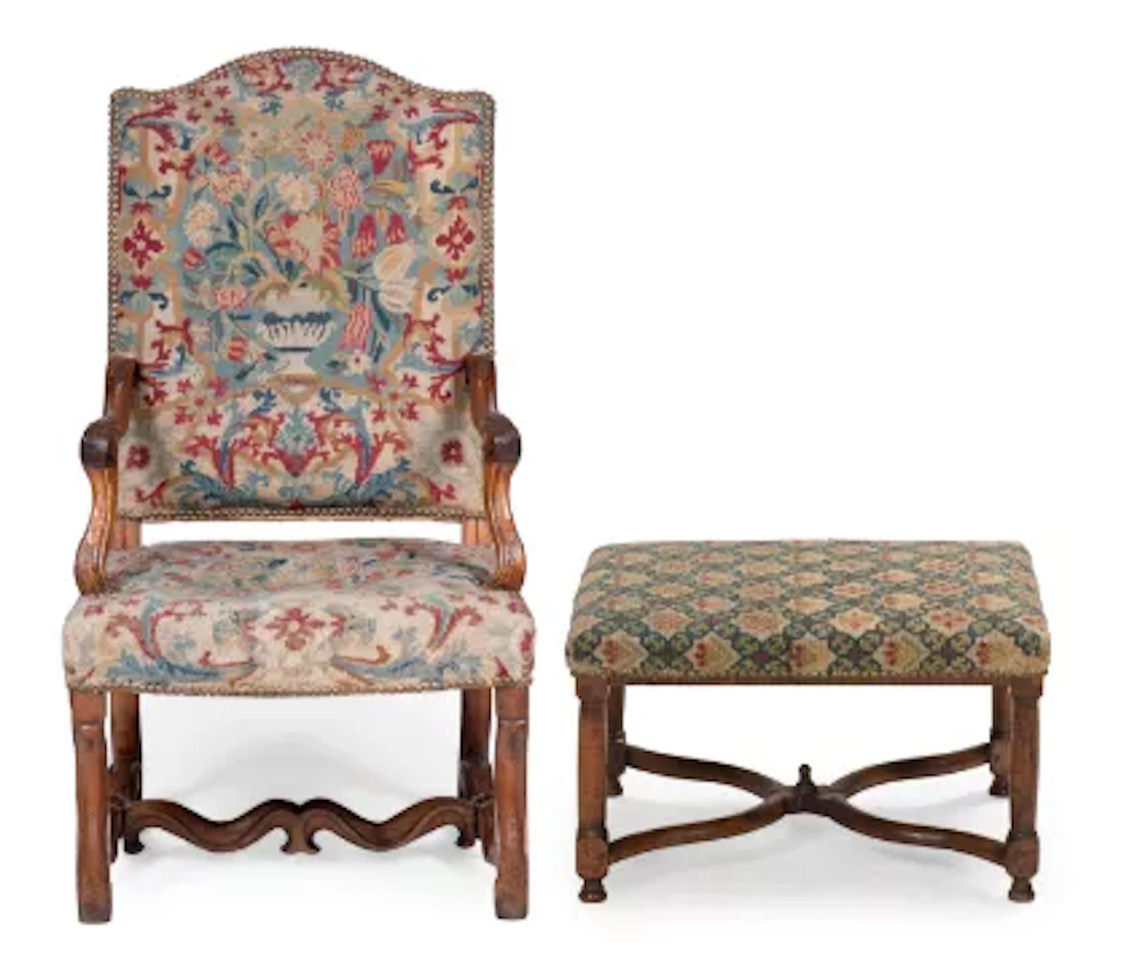 A LOUIS XIV WALNUT AND NEEDLEWORK UPHOLSTERED FAUTEUIL, CIRCA 1710