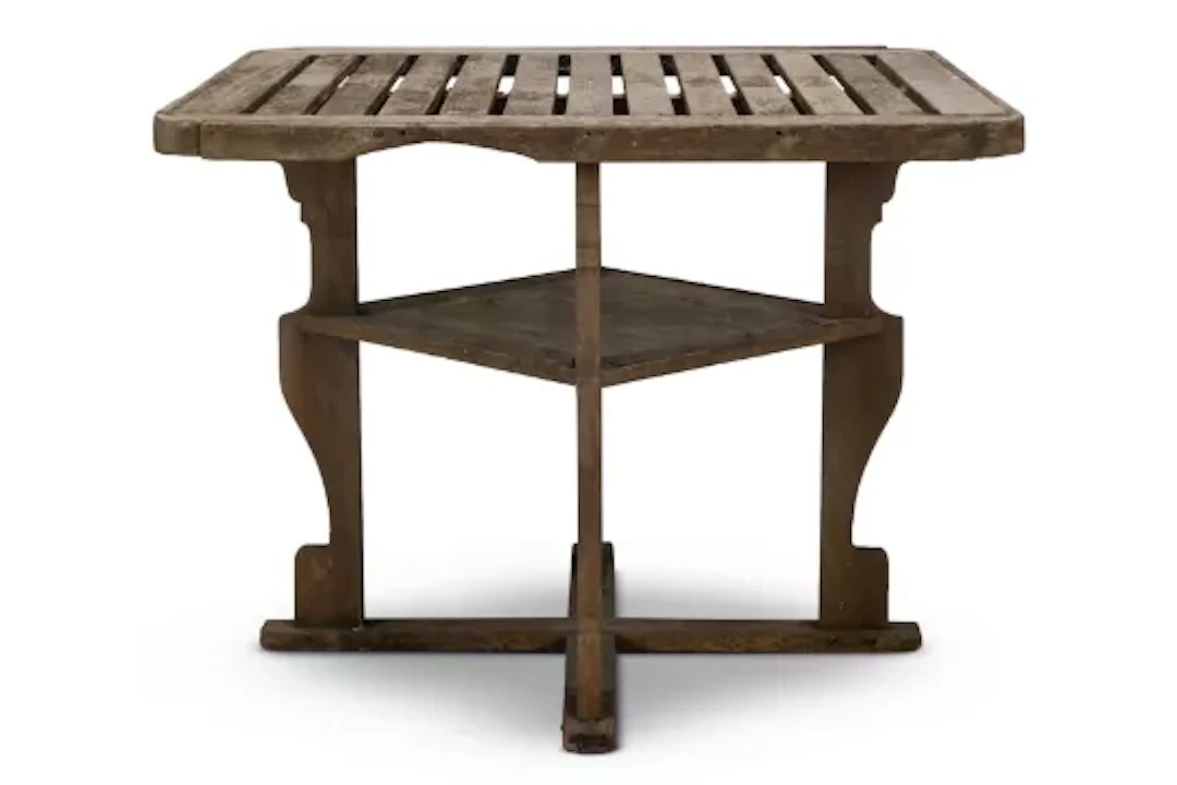 A HEALS SQUARE TOPPED, WEATHERED TEAK GARDEN TABLE, CIRCA 1910
