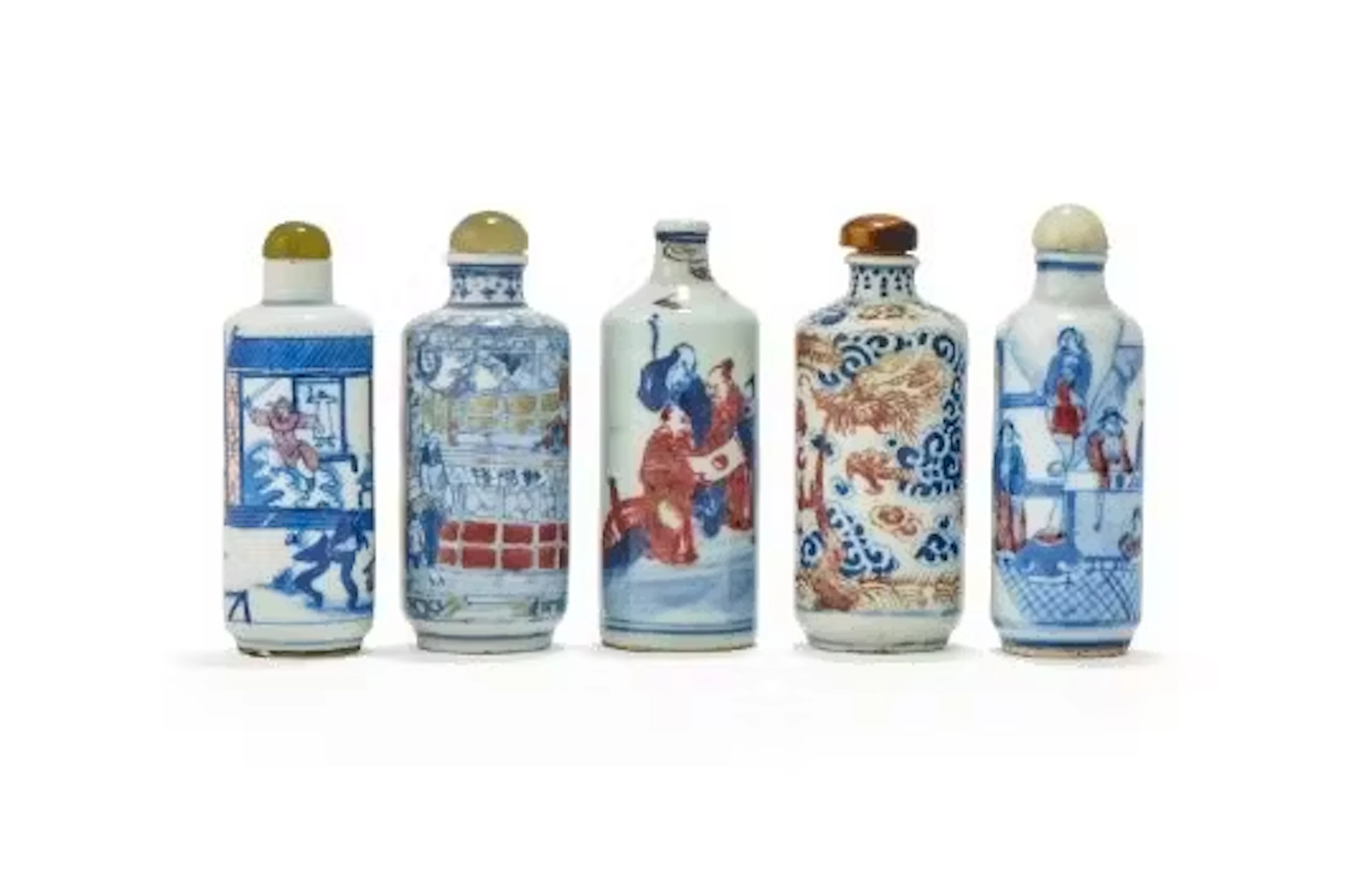 Five Chinese underglaze blue and red snuff bottles