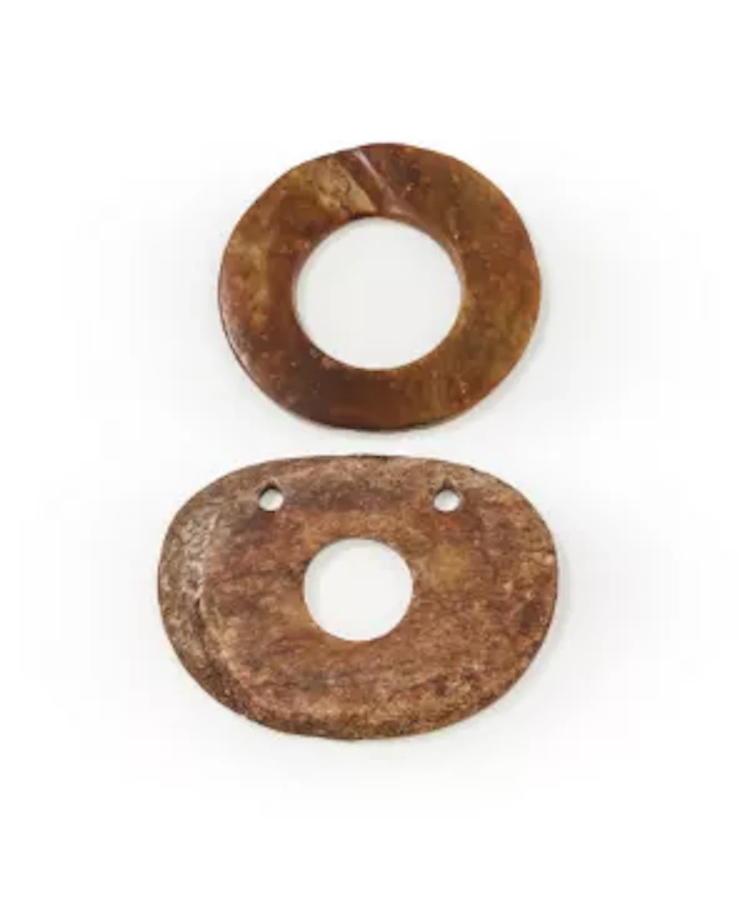 A Chinese mottled jade disc, bi, Neolithic period, Liangzhu culture
