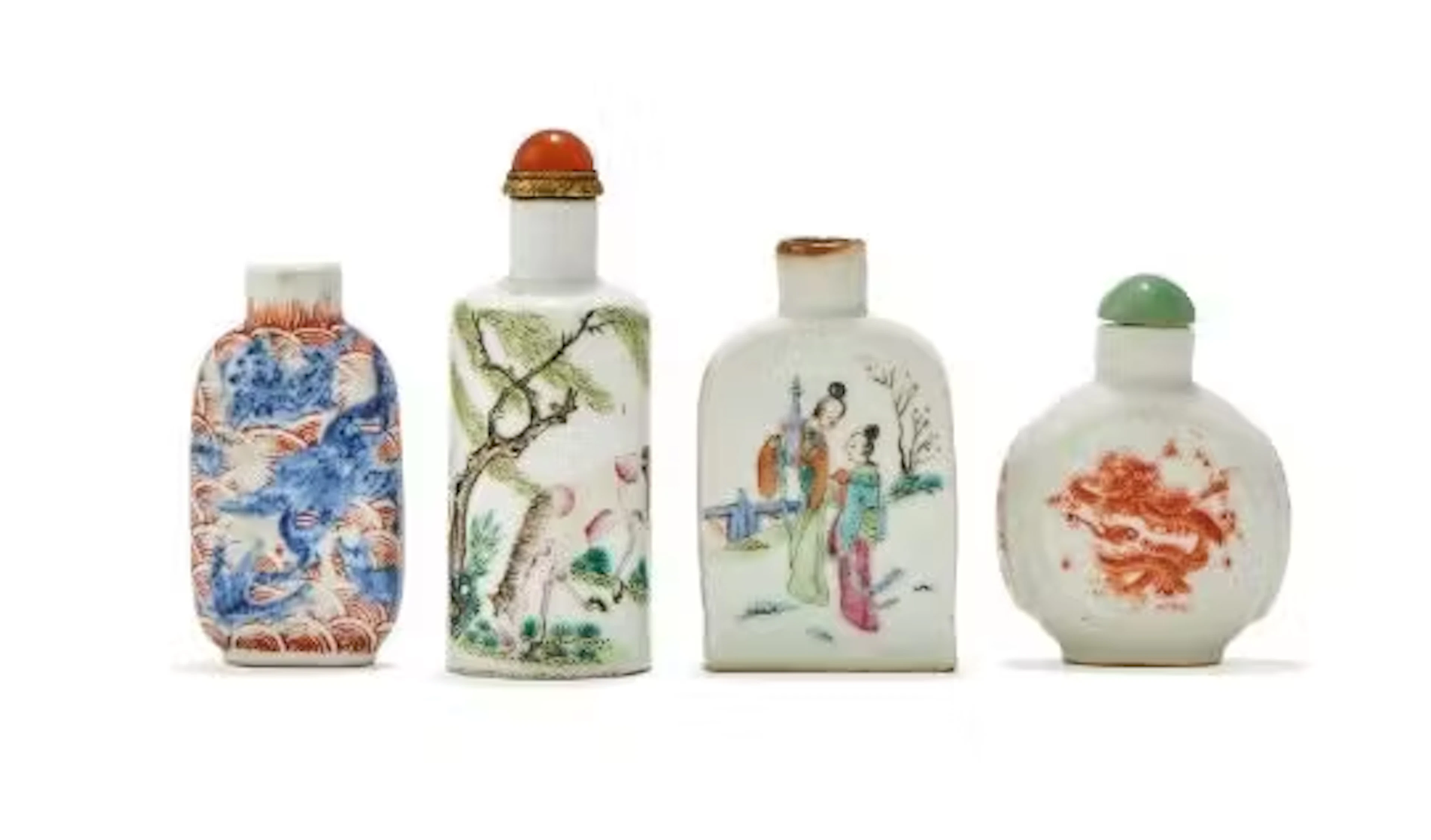 Four Chinese porcelain snuff bottles