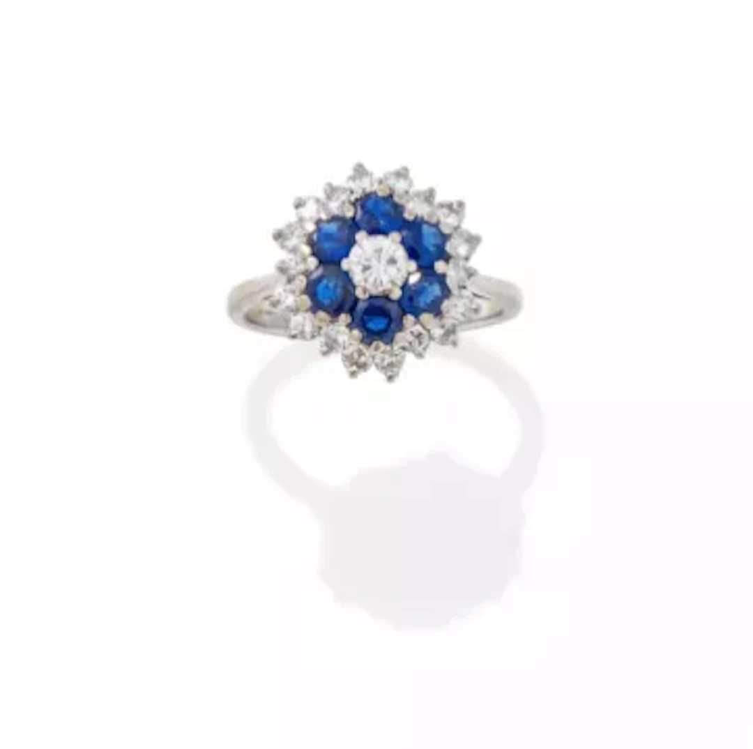 BOUCHERON, A SAPPHIRE AND DIAMOND CLUSTER RING