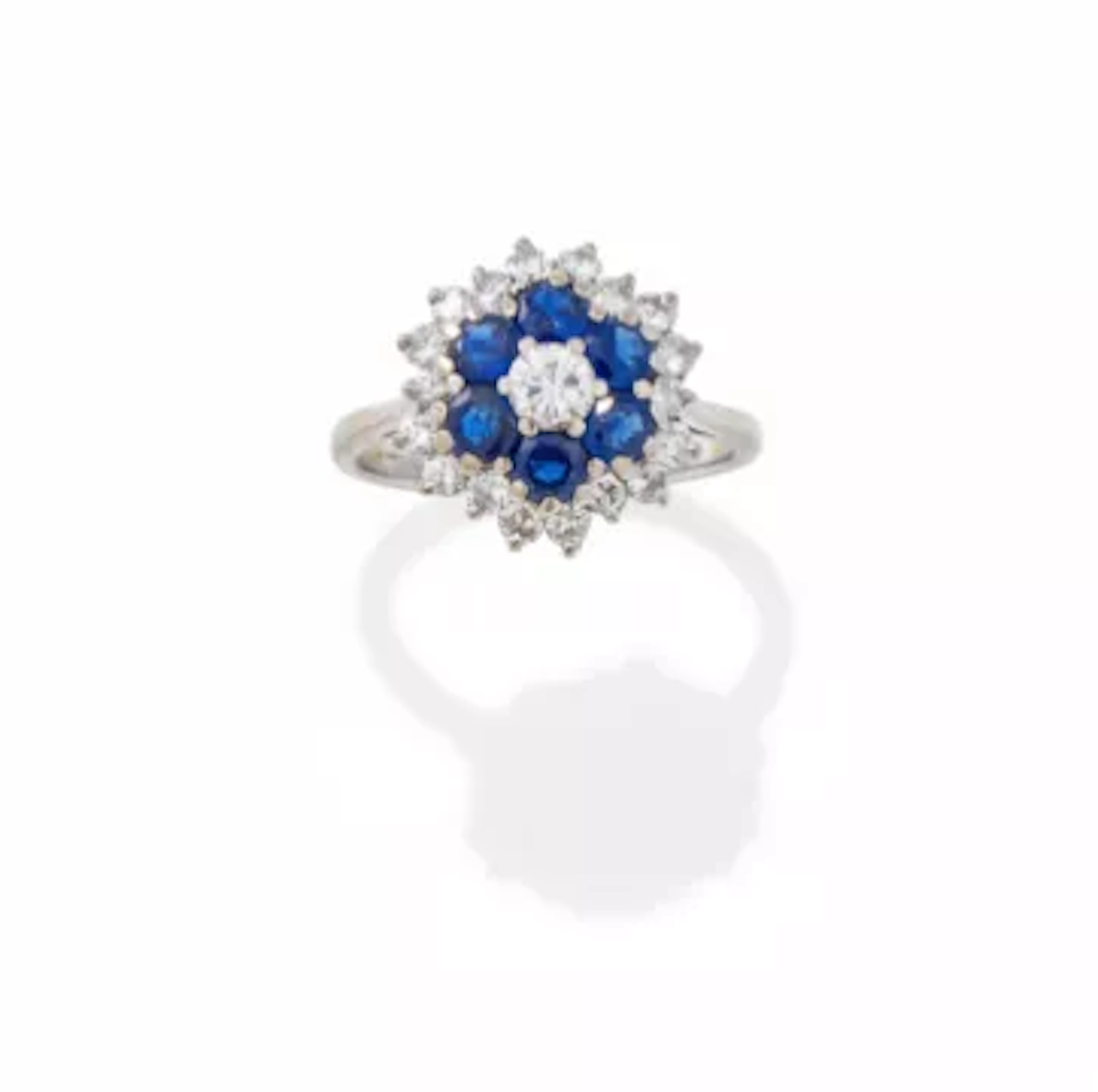 BOUCHERON, A SAPPHIRE AND DIAMOND CLUSTER RING
