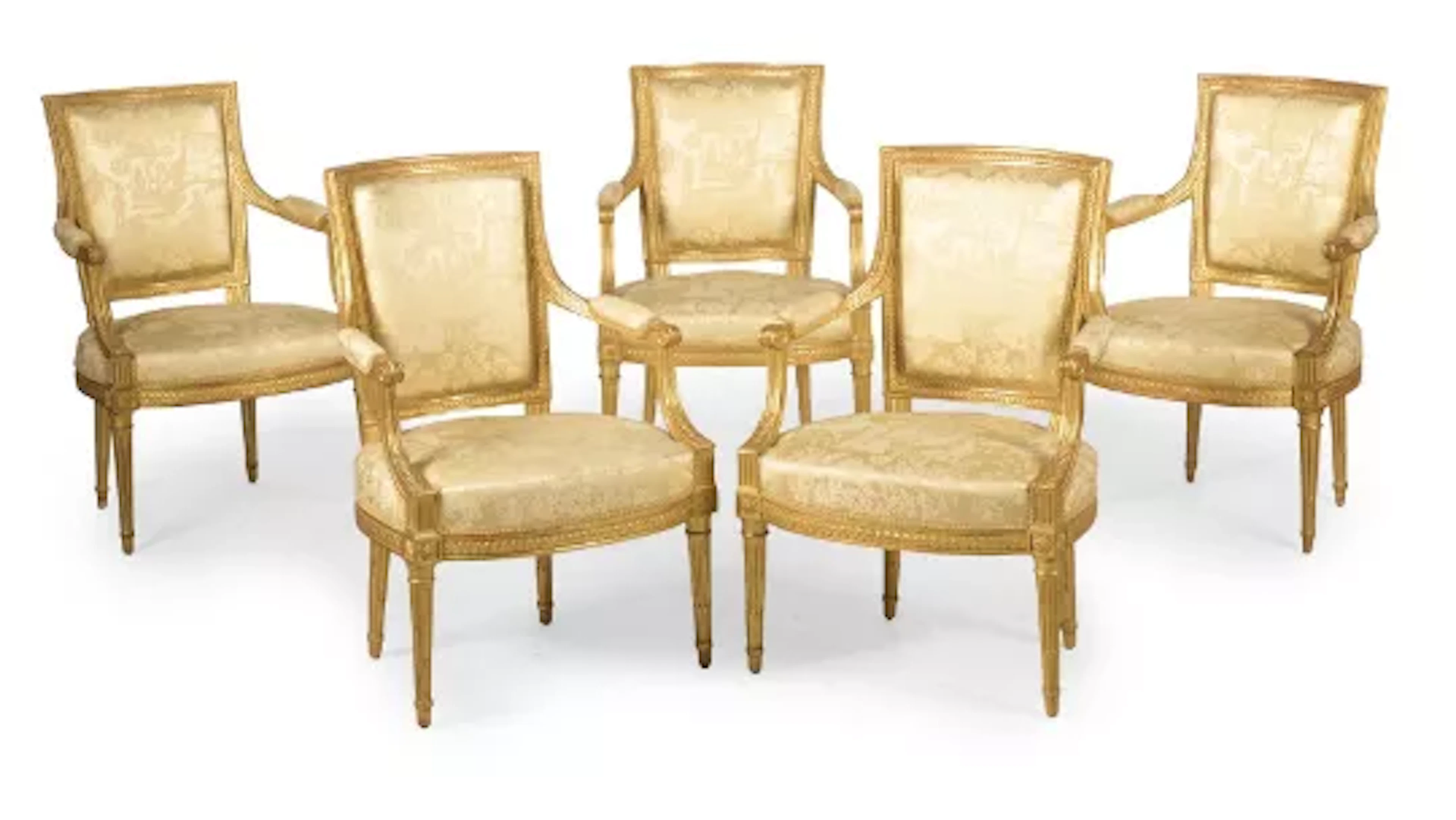 A SET OF FIVE LOUIS XVI CARVED GILT WALNUT ARMCHAIRS, BY HENRI JACOB