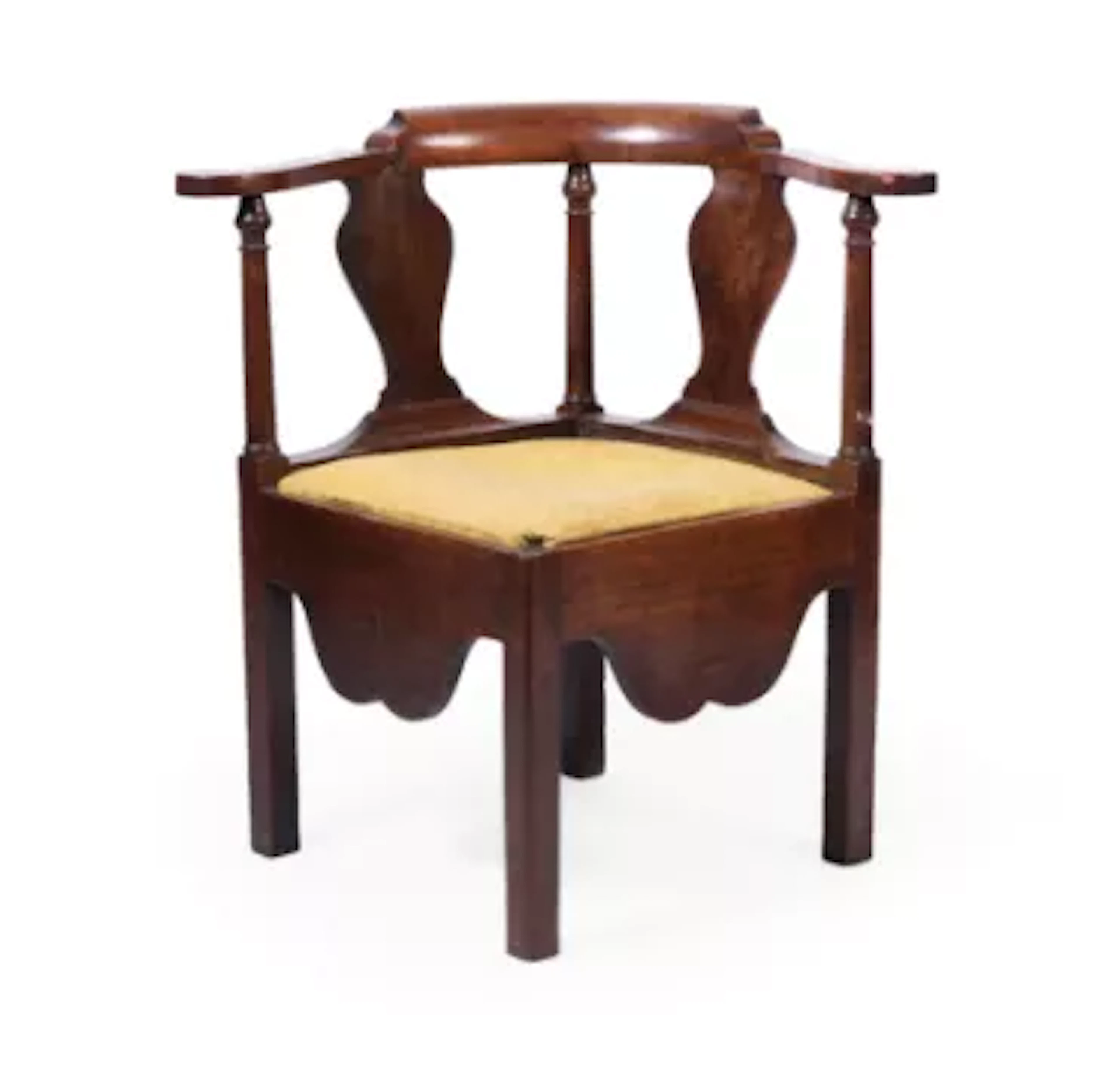 AN EARLY GEORGE III MAHOGANY CORNER ARMCHAIR, MID 18TH CENTURY