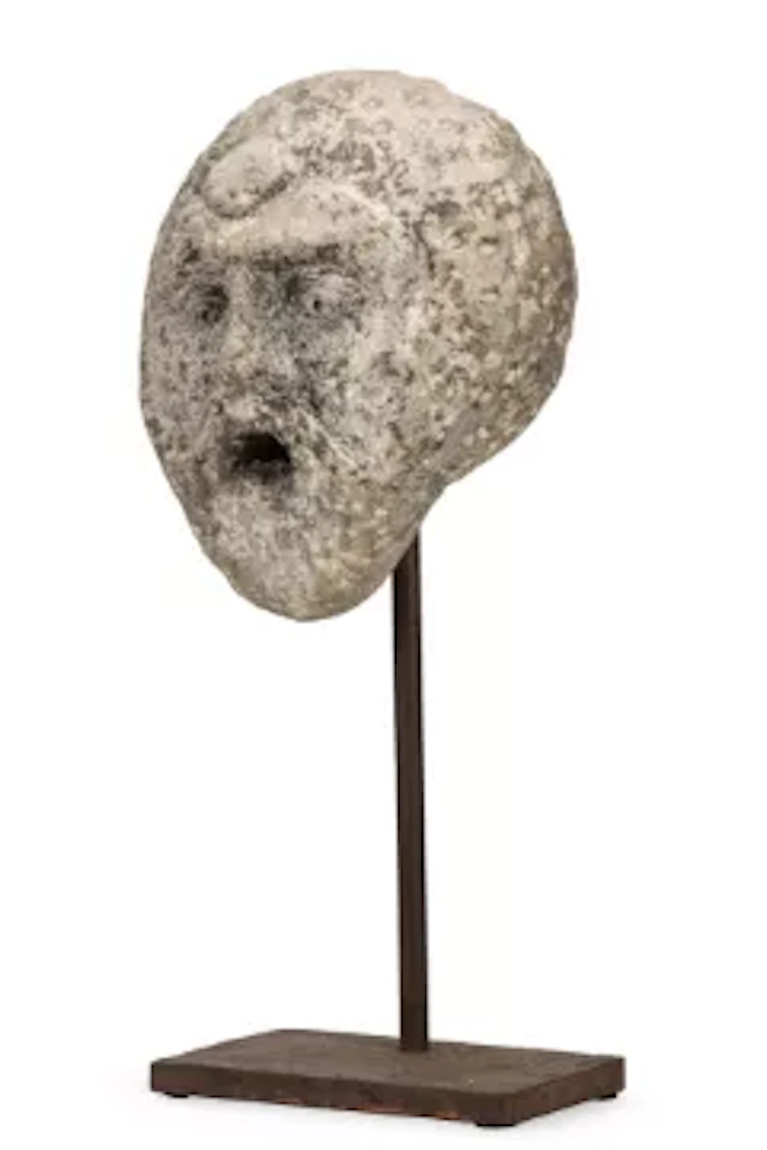 A MEDIEVAL CARVED STONE HEAD