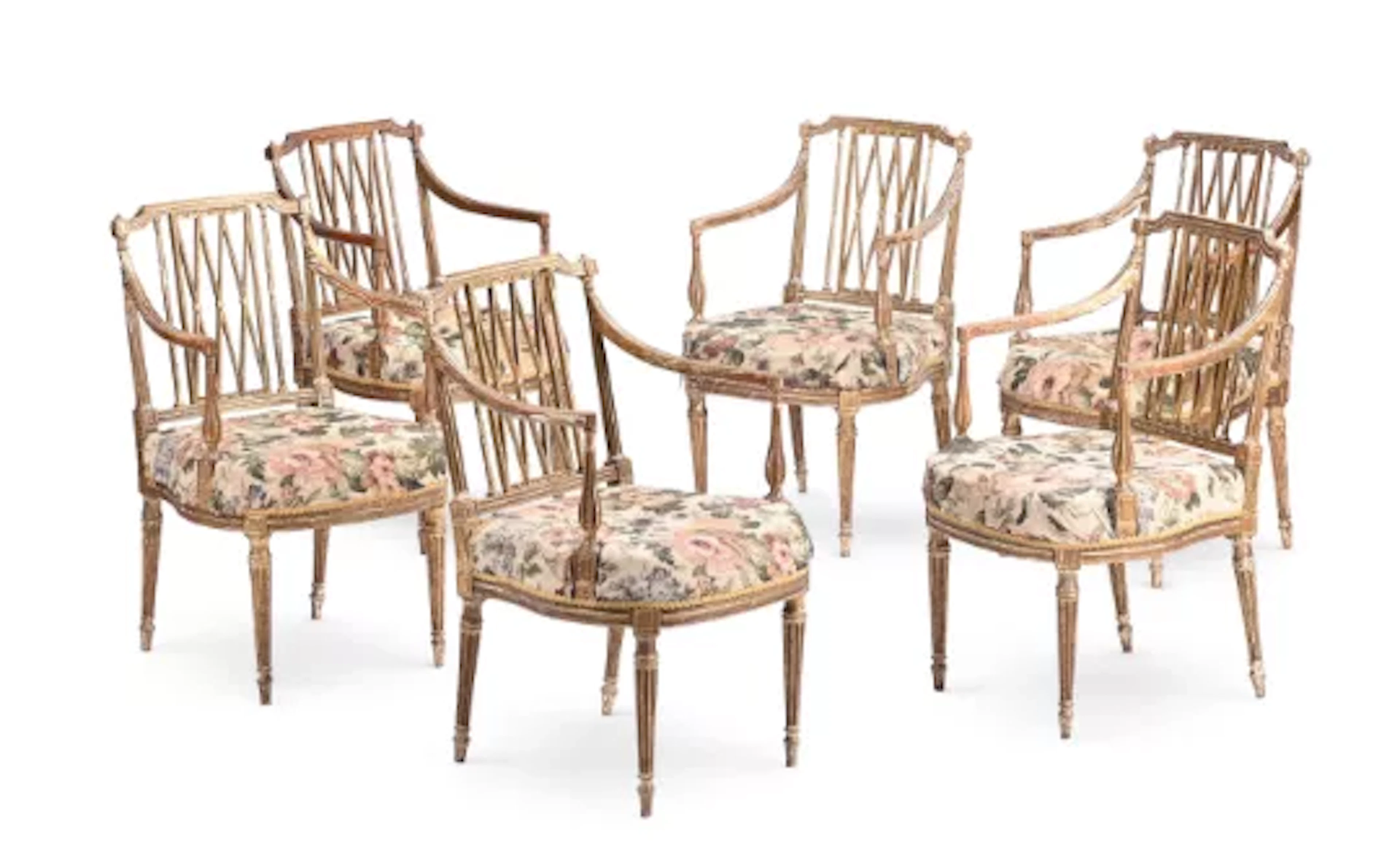 A SET OF SIX GEORGE III CARVED GILTWOOD ARMCHAIRS, ATTRIBUTED TO GILLOWS